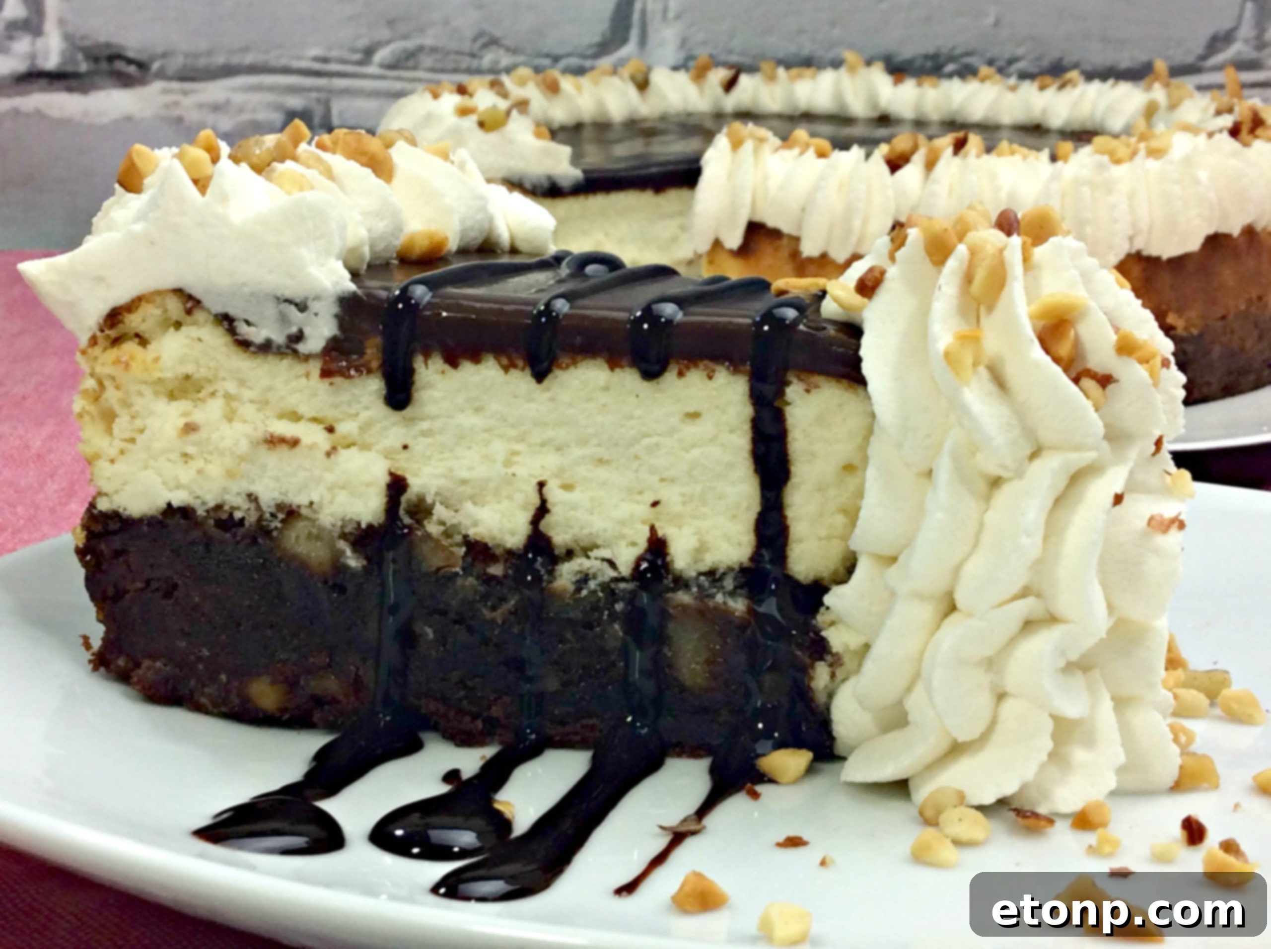 Overhead view of the Hot Fudge Sundae Brownie Cheesecake, showcasing its impressive topping