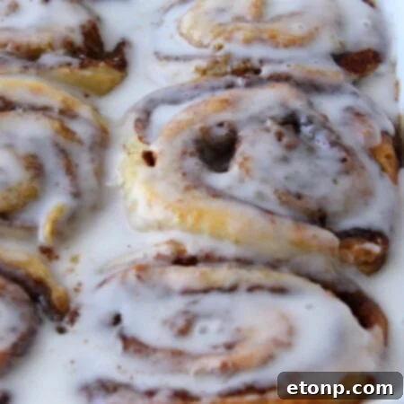 45 Minute Cinnamon Roll Magic 13 Featured image for the recipe card: A perfectly glazed cinnamon bun.