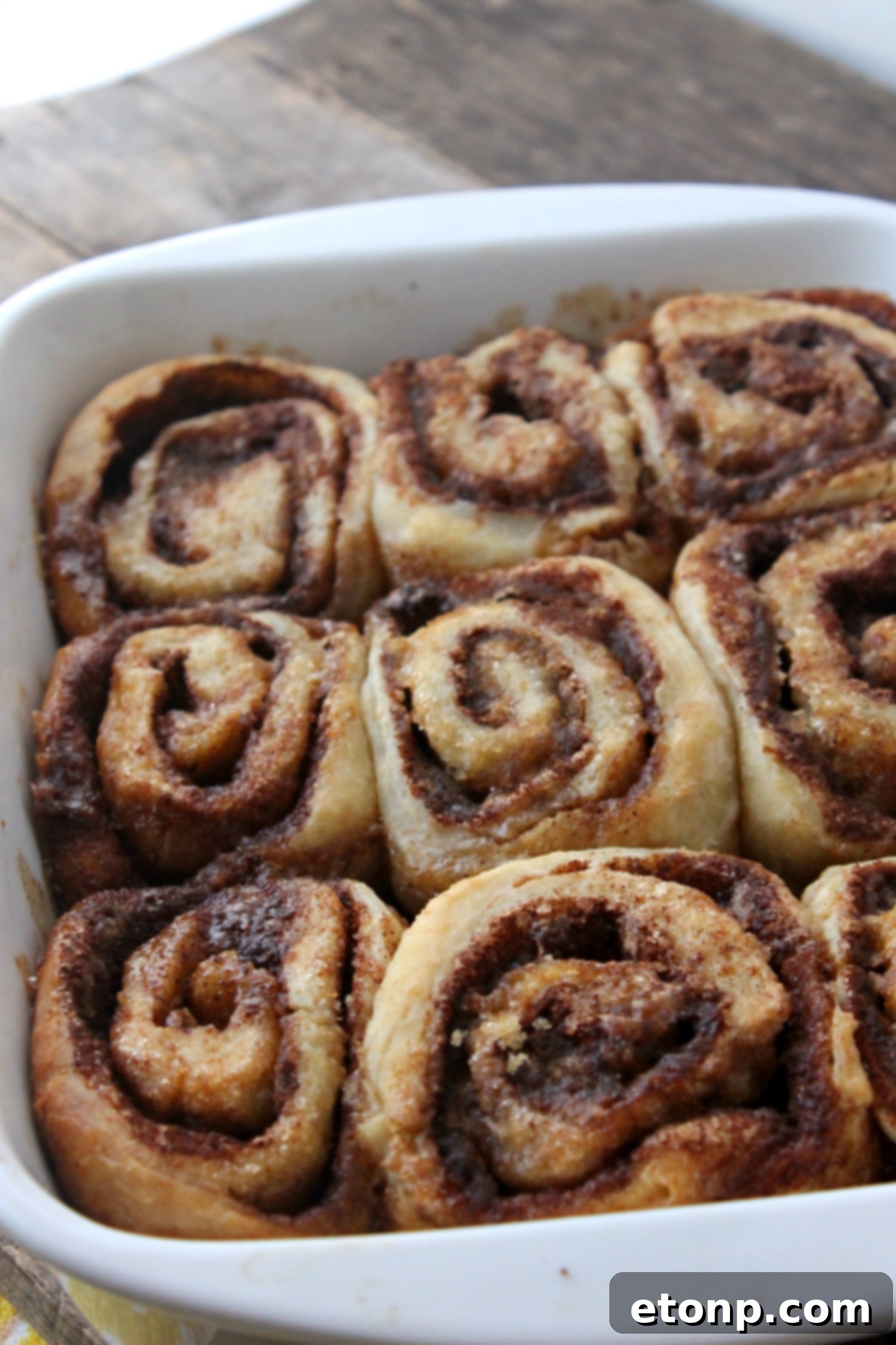 45 Minute Cinnamon Roll Magic 3 A pan of warm, gooey homemade cinnamon buns, ready to be served.