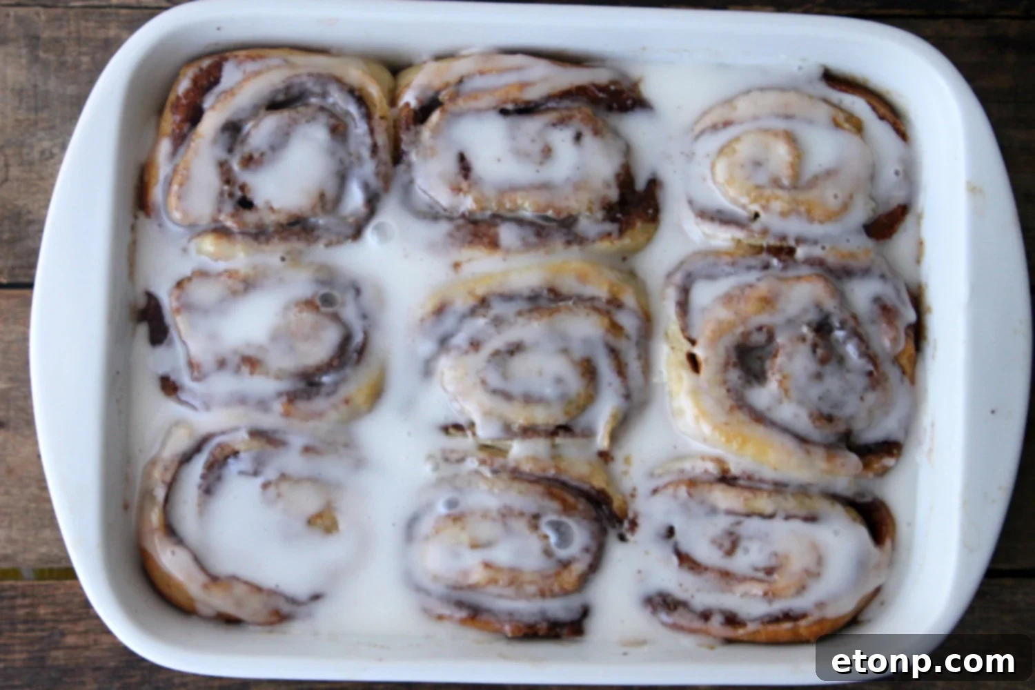 45 Minute Cinnamon Roll Magic 10 Side view of a large, perfectly baked cinnamon bun, showing its height and softness.