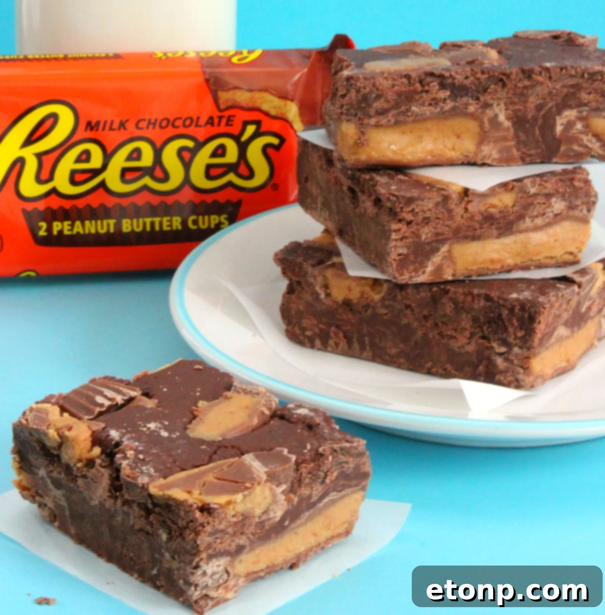 Gift-wrapped boxes containing homemade Reese's fudge, perfect for sharing during the holidays.