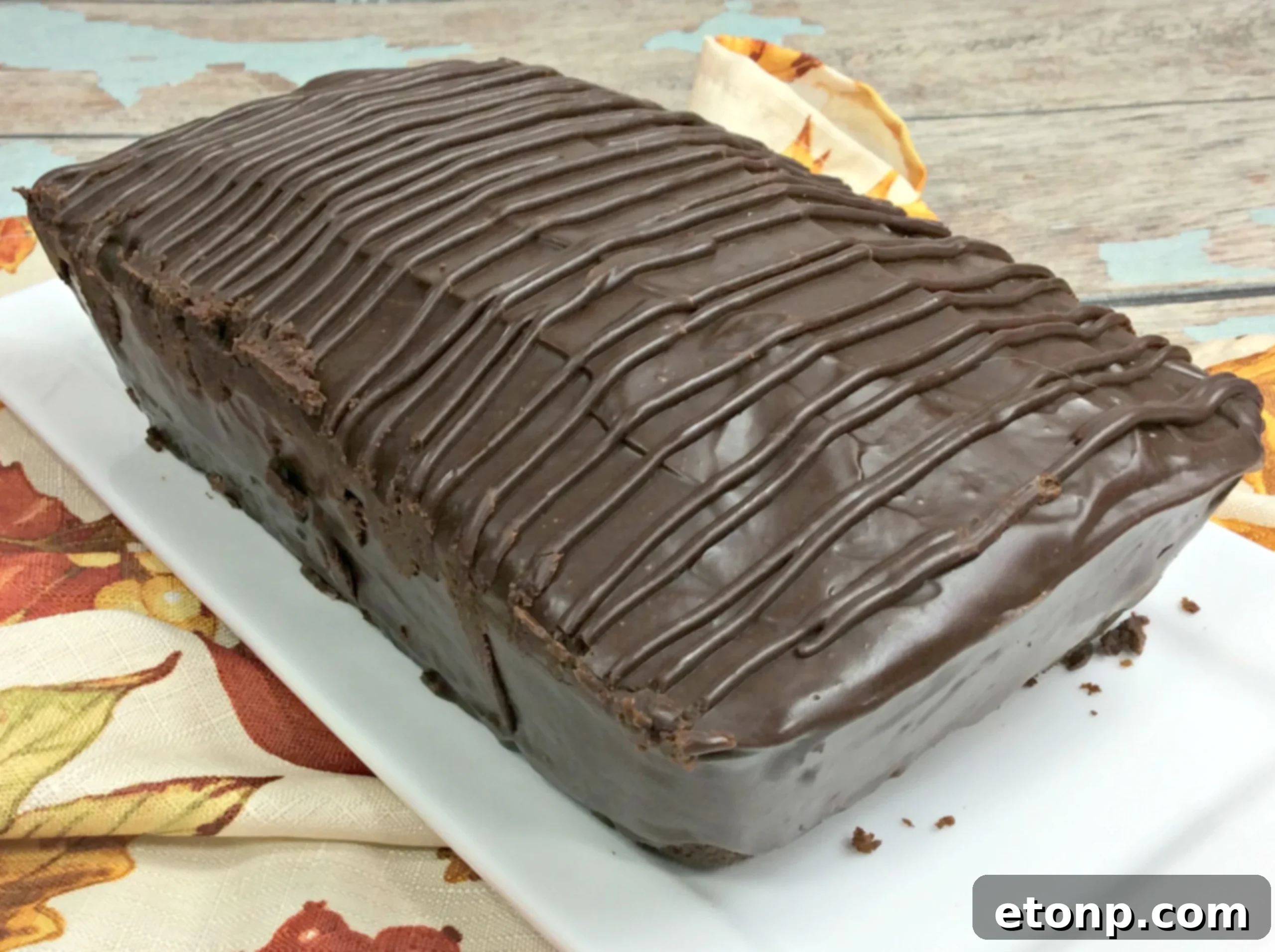 Delicious slice of chocolate pumpkin pound cake with ganache
