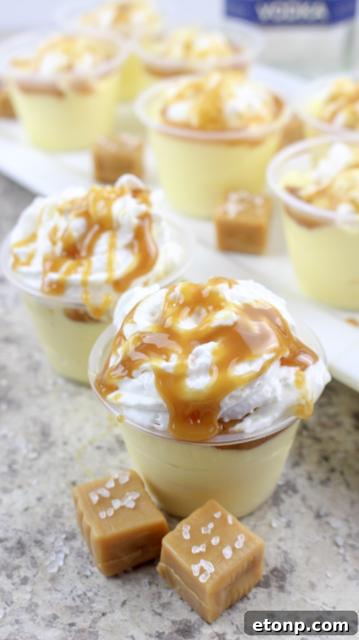 Close-up of a single Salted Caramel Pudding Shot with a spoon