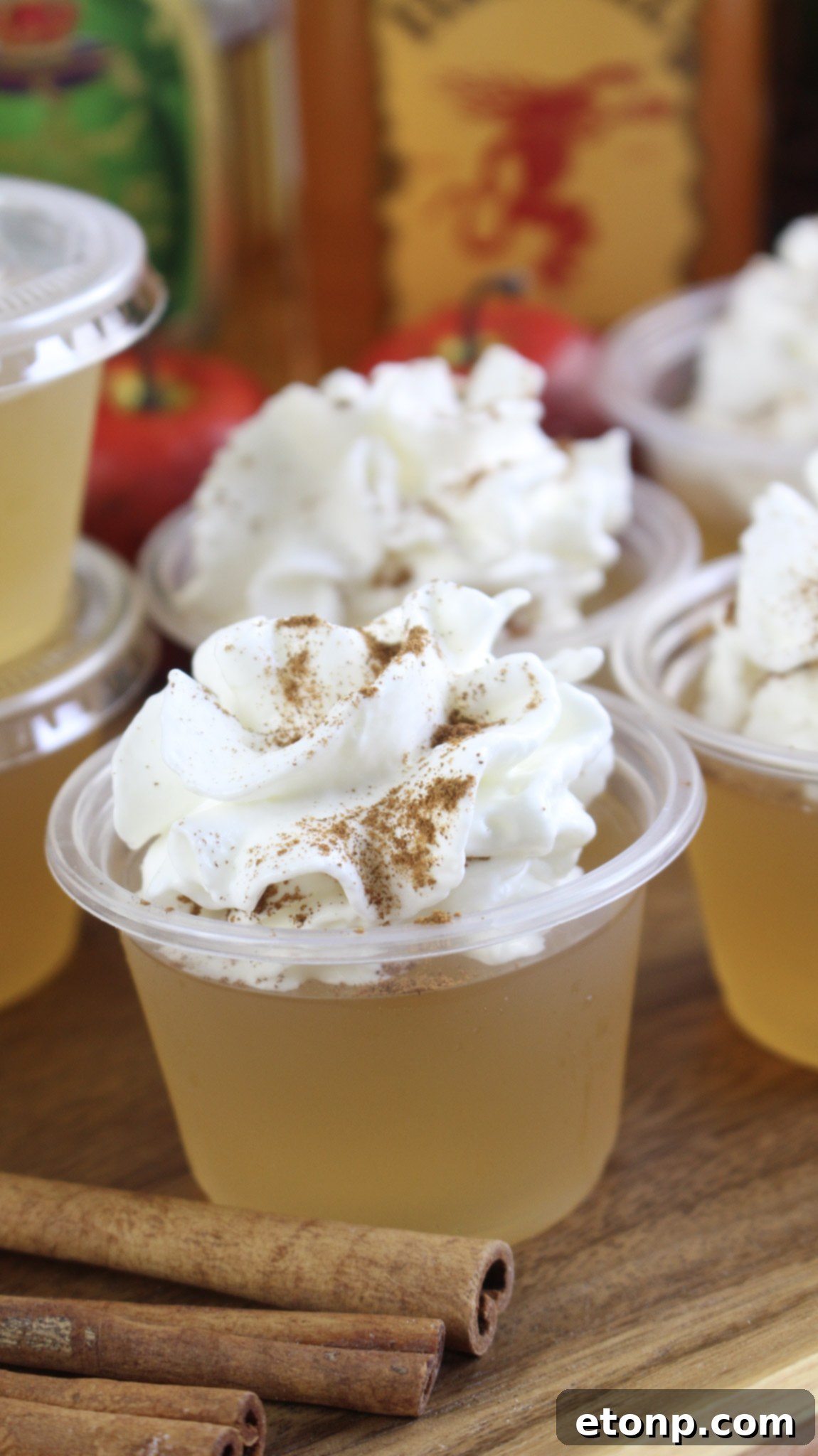 Spiced Apple Pie Shooters 8 Multiple Apple Pie Jello Shots on a plate, highlighting their inviting appearance and easy serving.