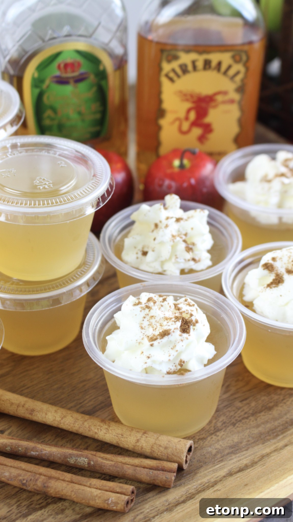 Spiced Apple Pie Shooters 10 A single clear Jello shot showing its vibrant color and smooth texture.
