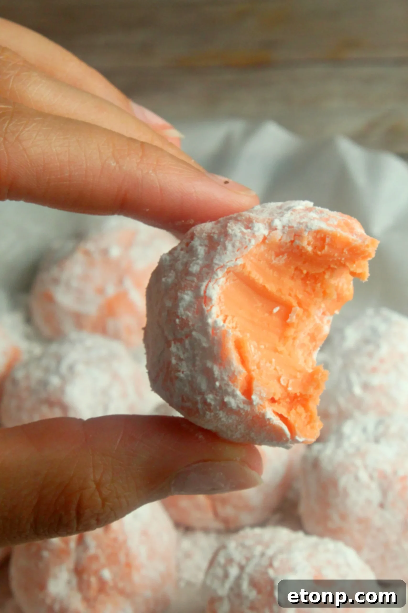 More No-Bake Orange Creamsicle Truffles, showing a variety of angles and their vibrant orange hue