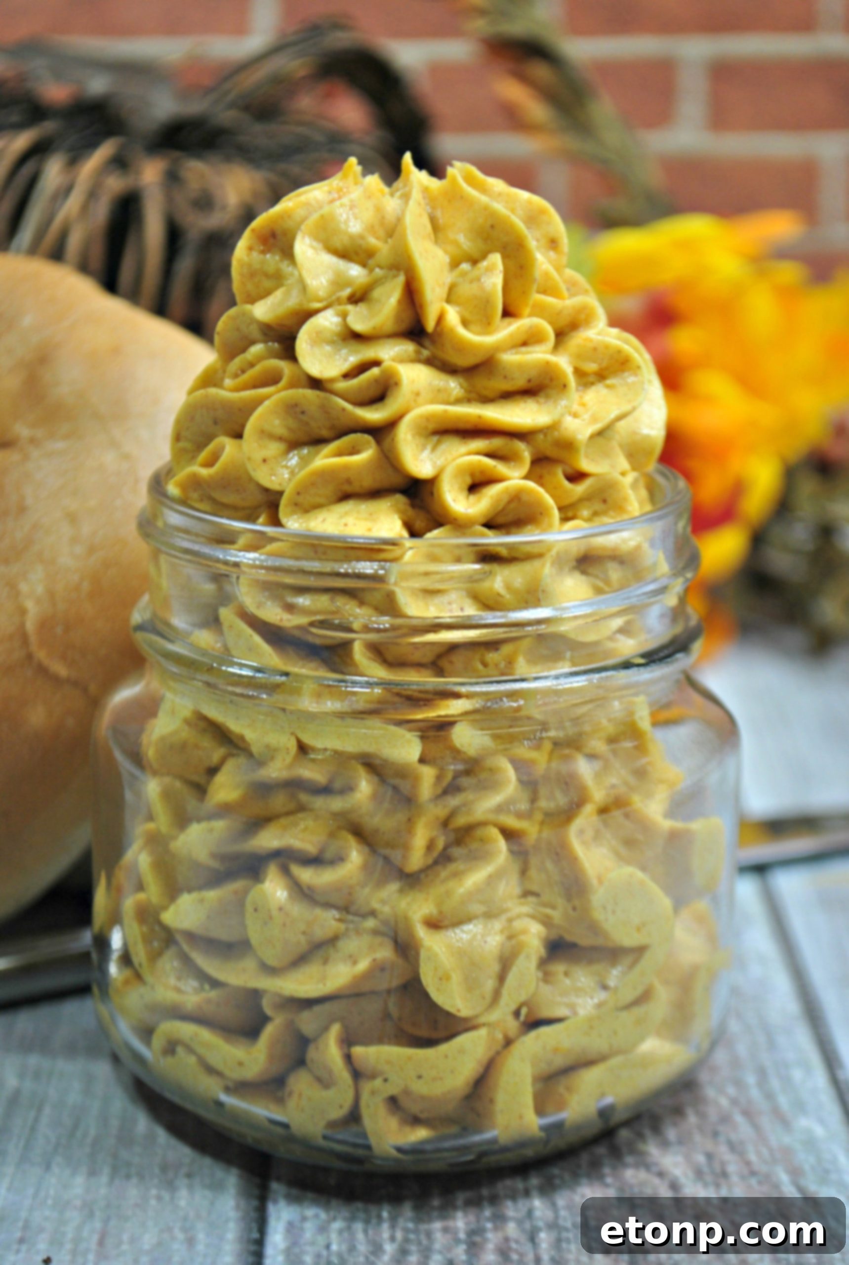 Close-up of fluffy Honey Pumpkin Whipped Butter in a bowl