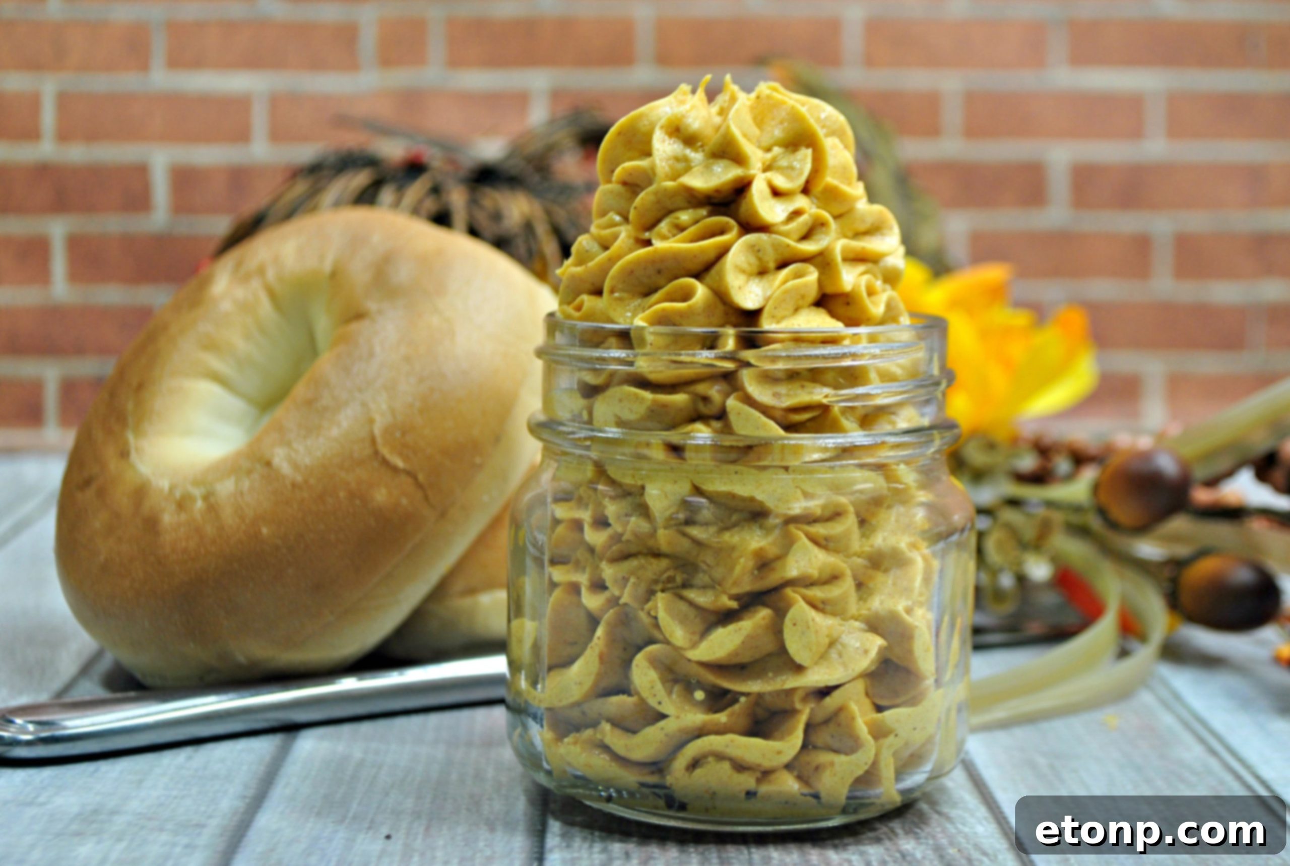 Honey Pumpkin Whipped Butter spread on a variety of breakfast items