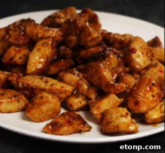 Close-up of perfectly seasoned chicken pieces for fajita pasta