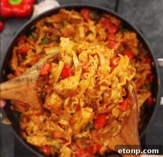 Cooked chicken fajita pasta with creamy sauce and vegetables