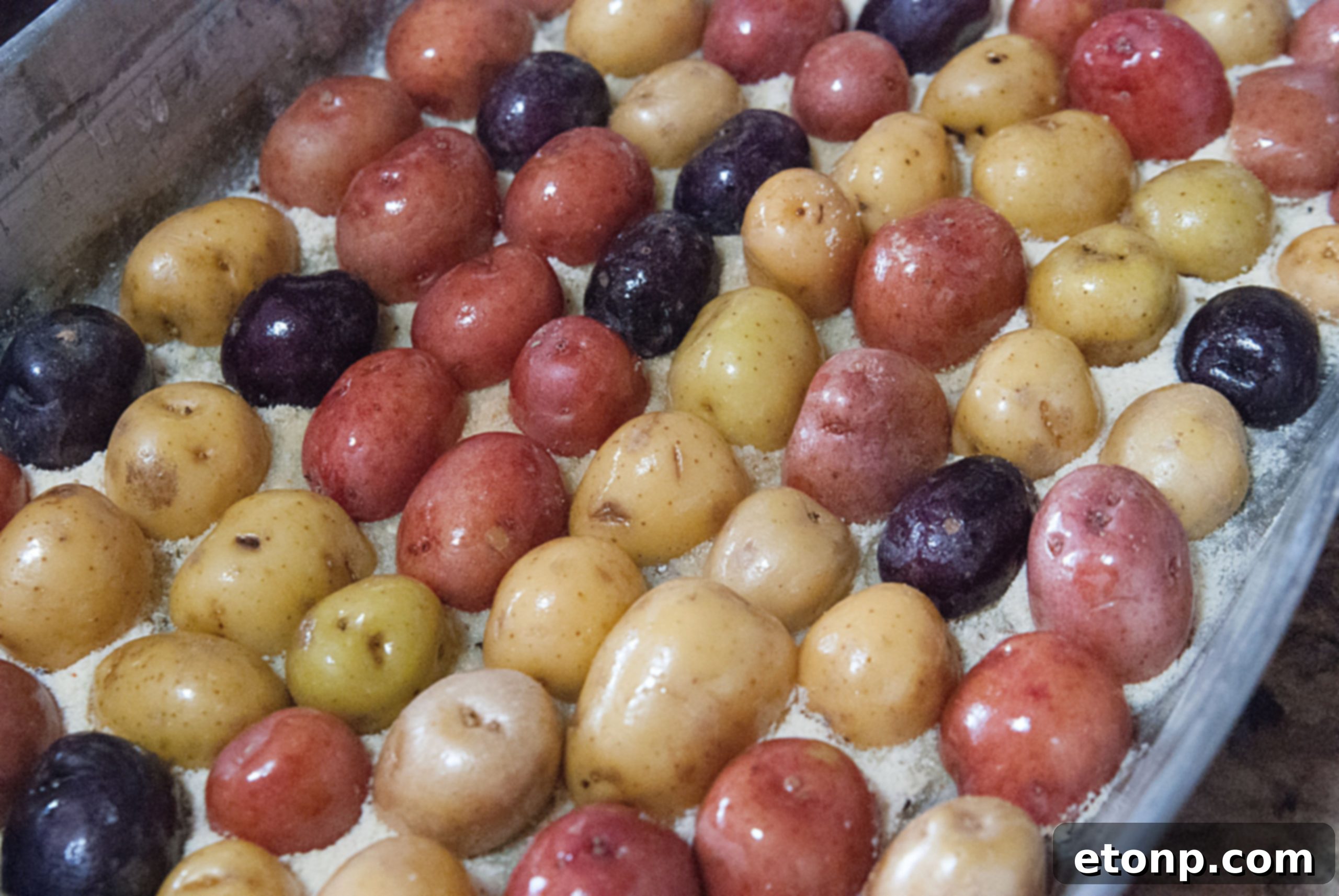 Close-up of crispy garlic parmesan potatoes ready to serve