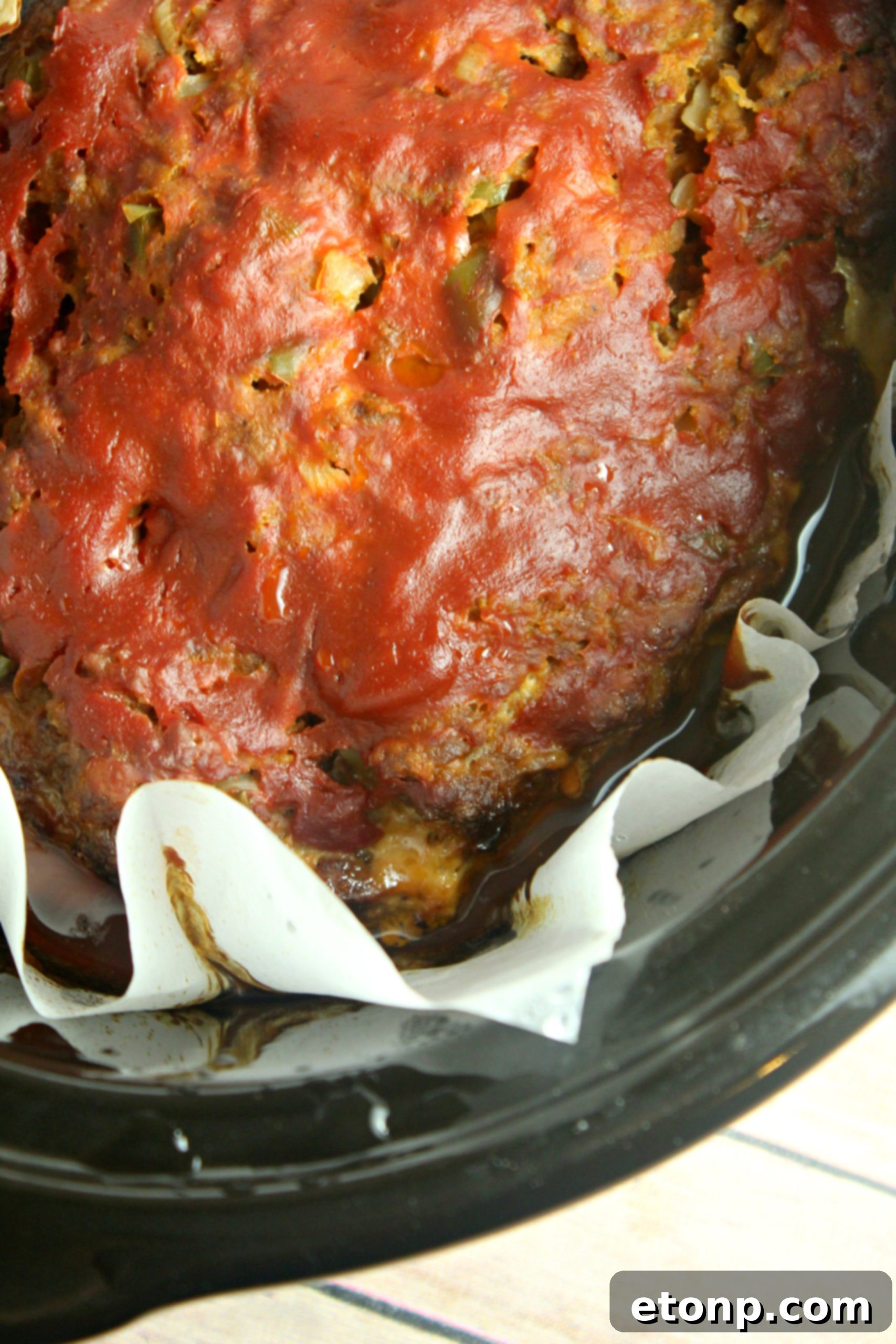 The slow cooker working its magic, preparing a family-favorite meatloaf dinner.