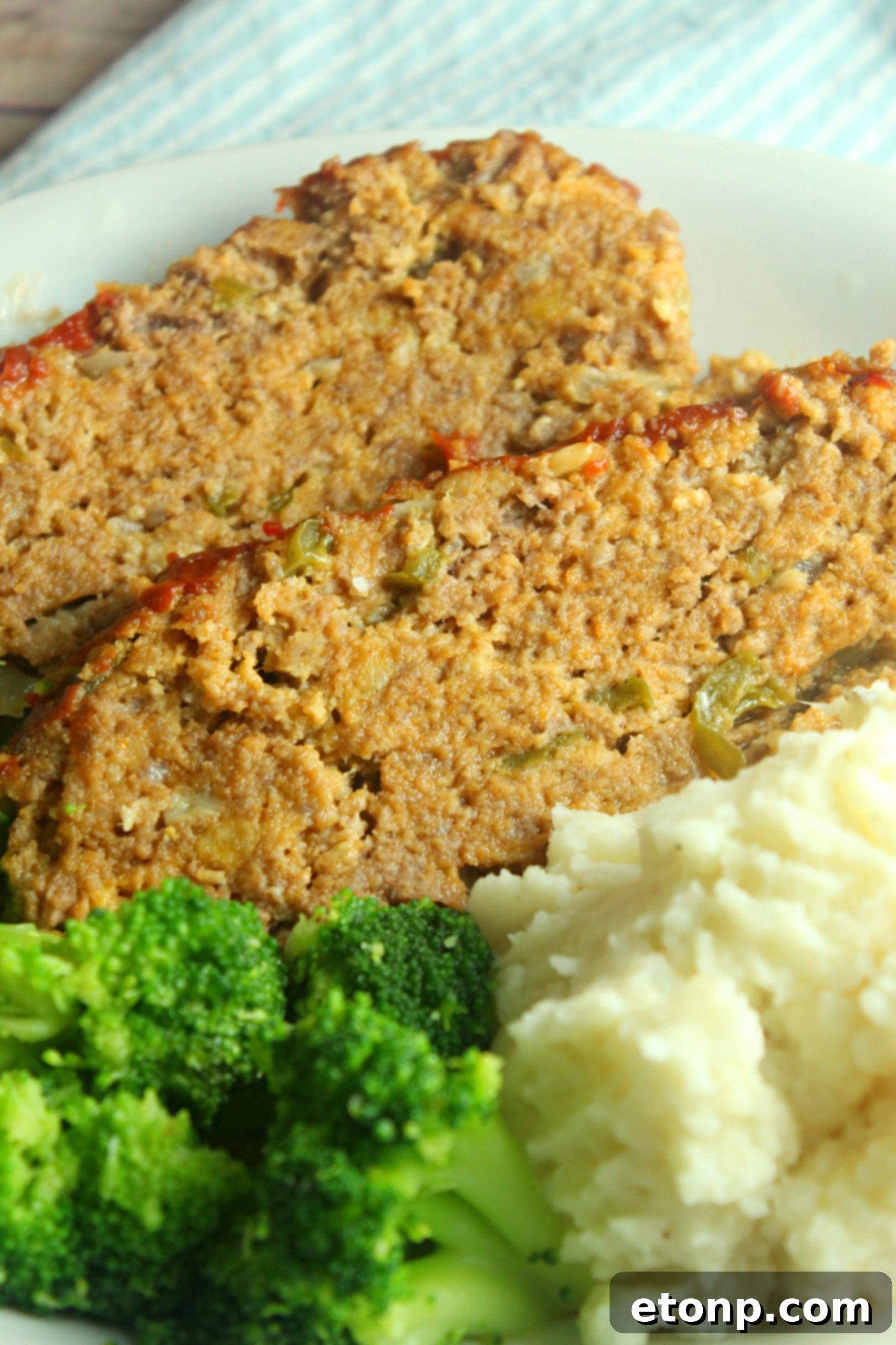 Succulent slow cooker meatloaf ready for dinner, beautifully presented.