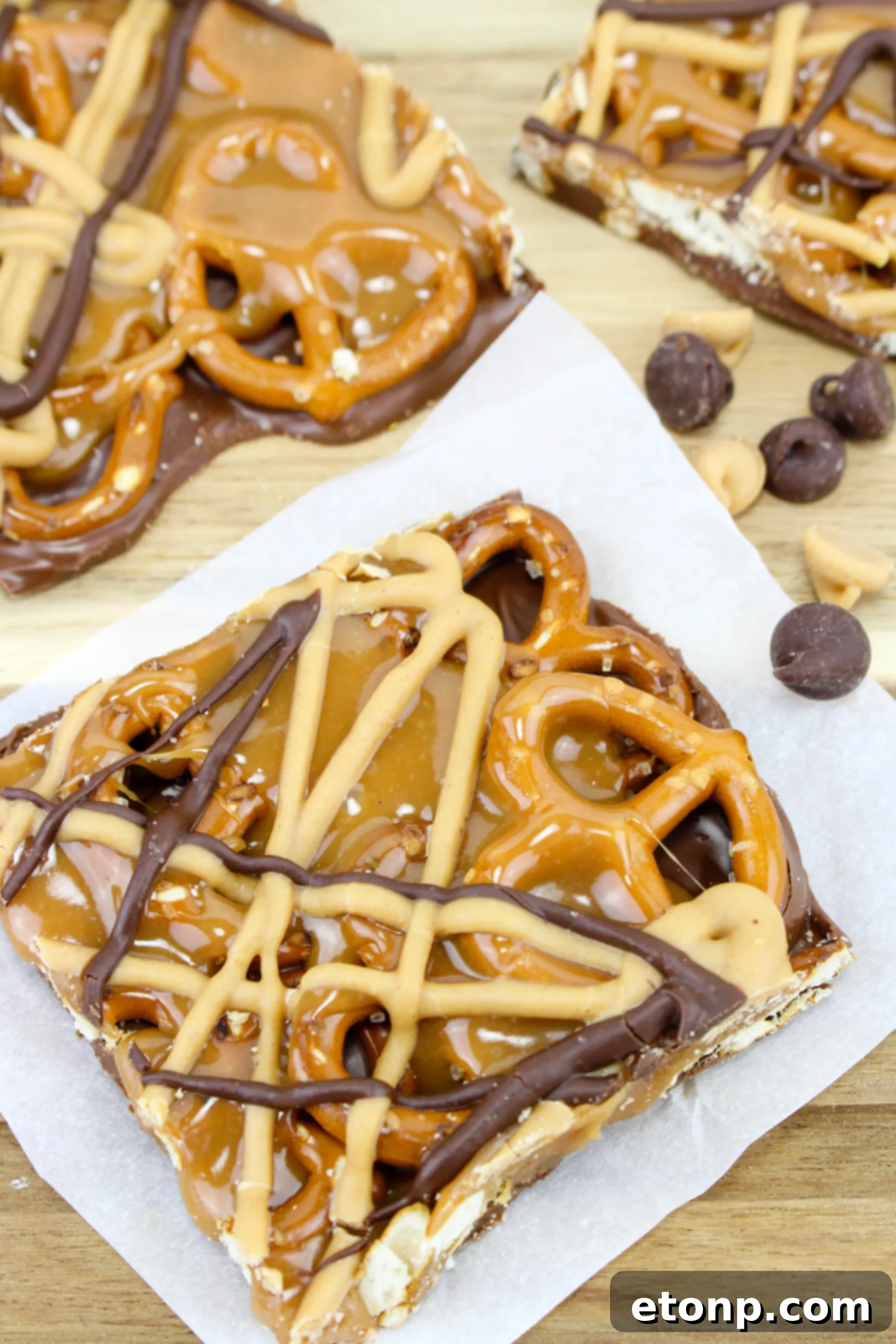 Salty Sweet No-Bake Pretzel Caramel Bars 2 No Bake Caramel Pretzel Crack Bars stacked up close