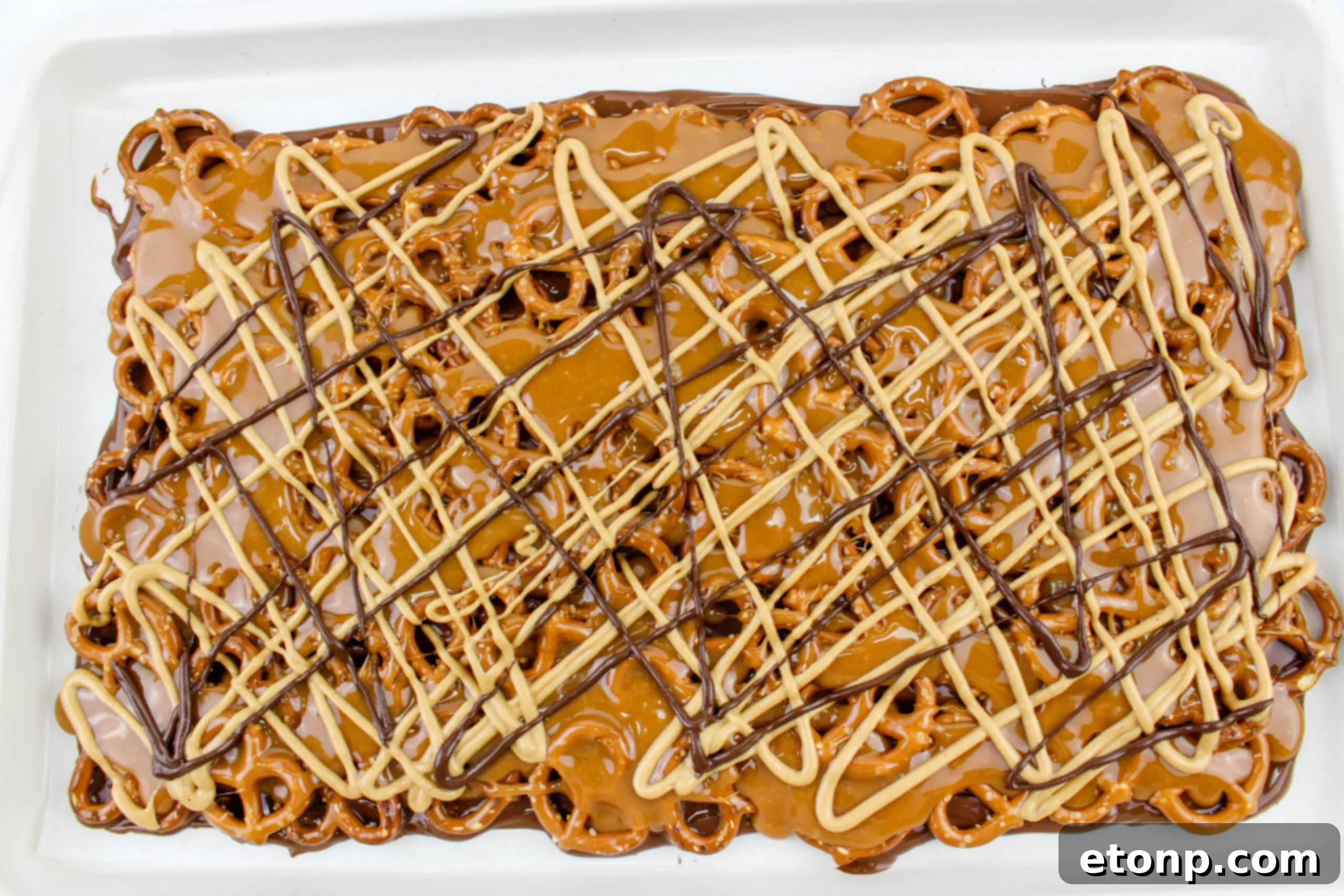 Salty Sweet No-Bake Pretzel Caramel Bars 5 No Bake Caramel Pretzel Crack Bars with close up on texture