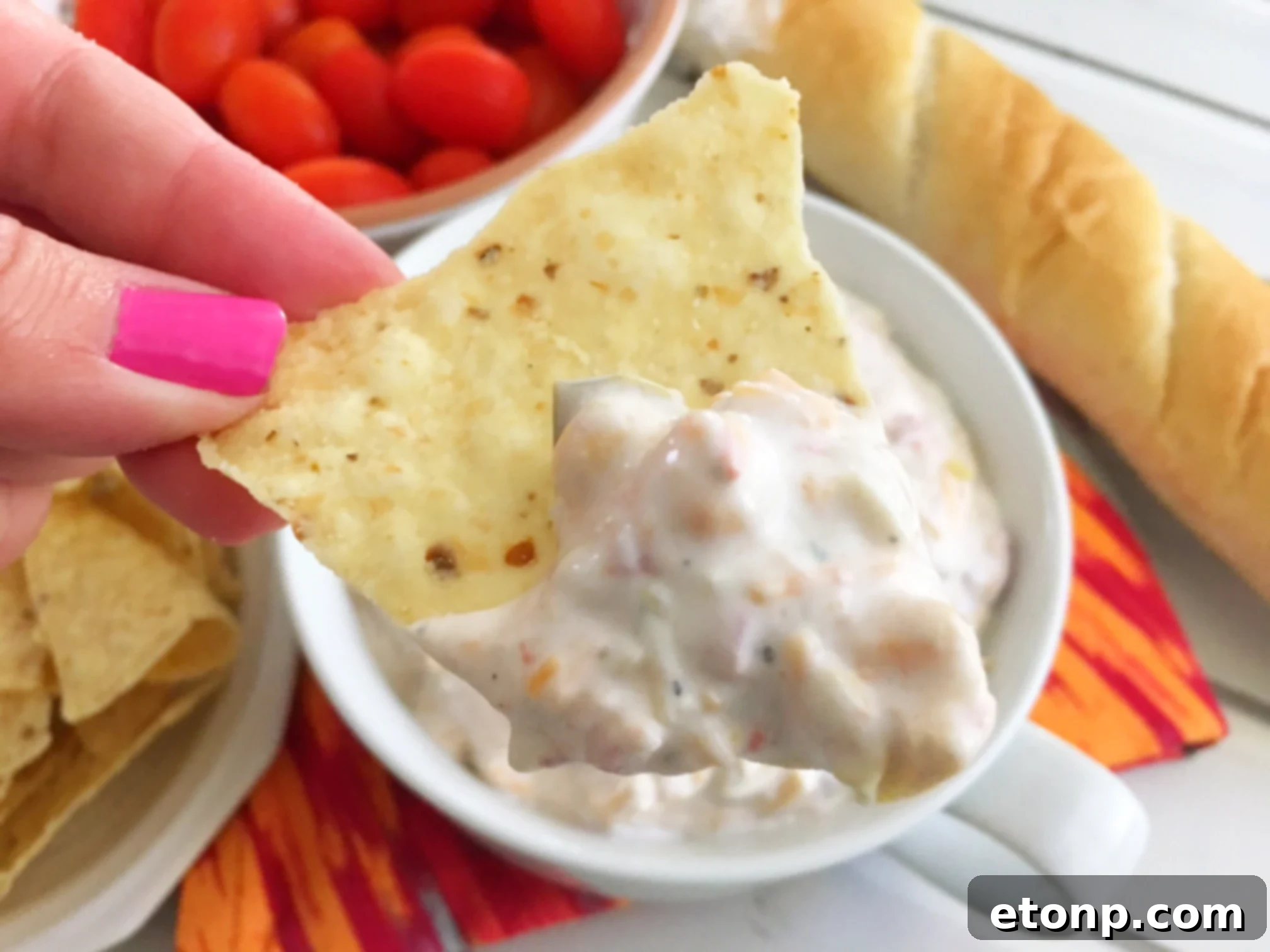 Delicious 5-Ingredient Fiesta Dip in a serving bowl with tortilla chips