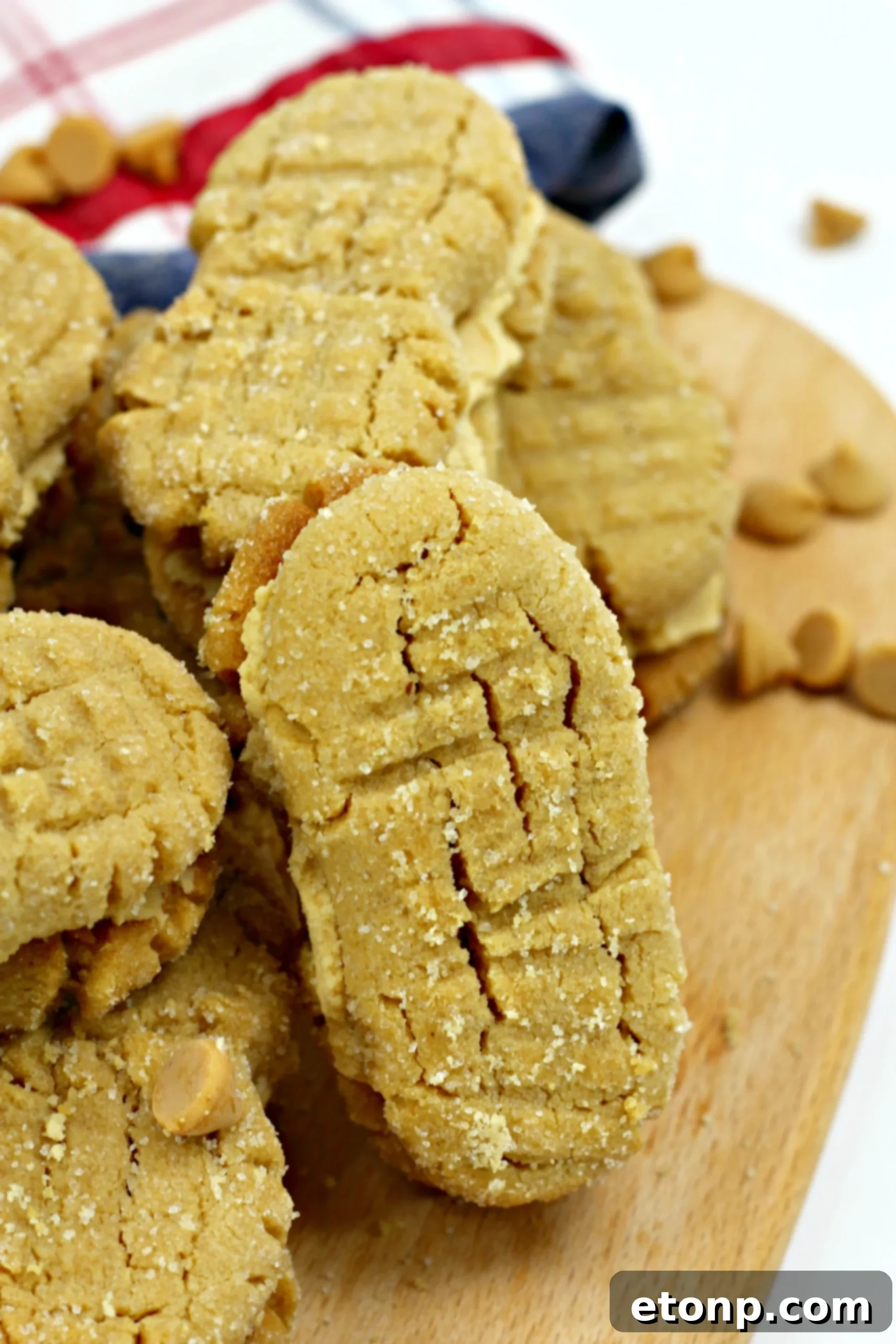 A tray of freshly baked homemade Nutterbutter cookies ready for filling.
