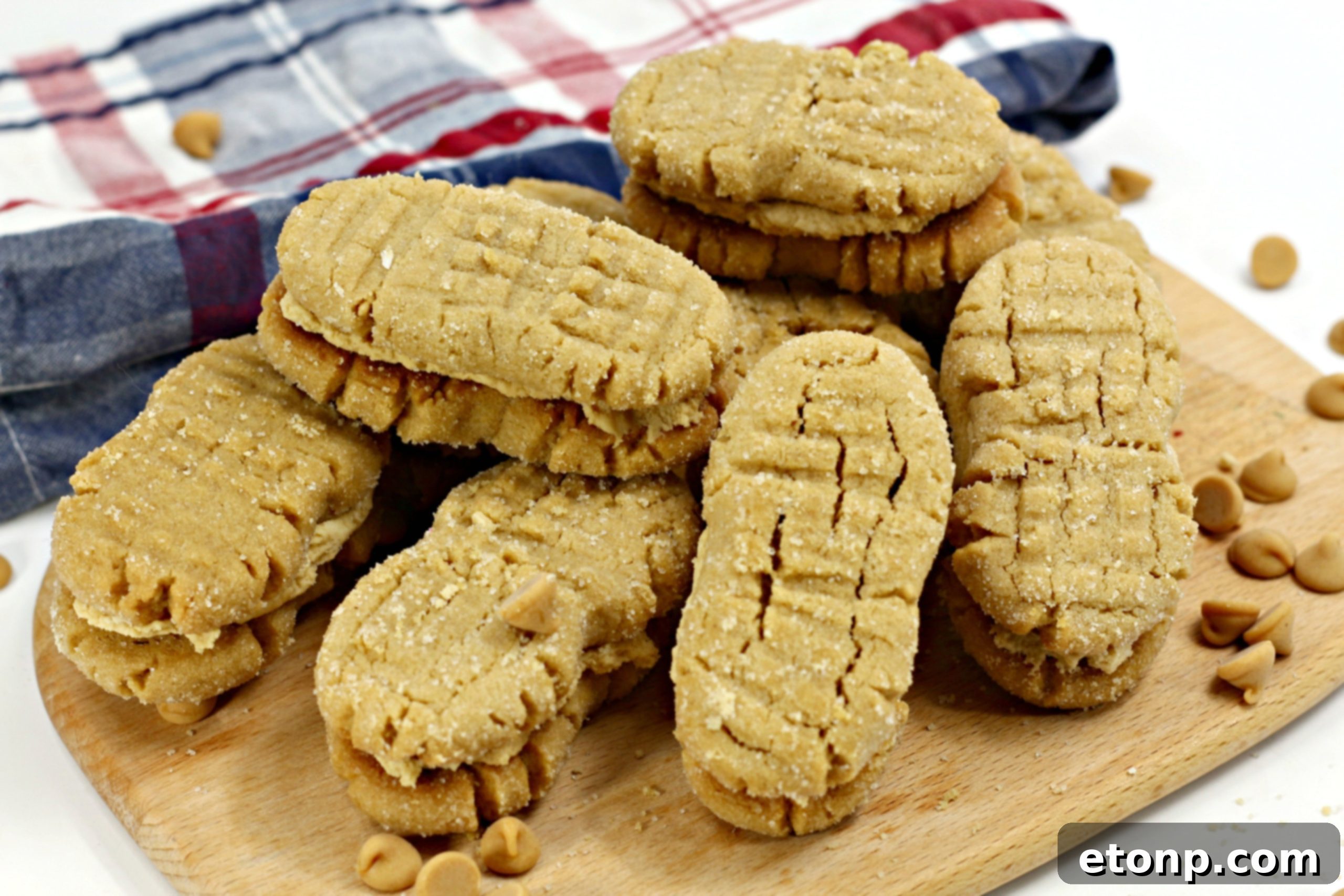 Two halves of a Nutterbutter cookie, showing the textured exterior and soft interior.