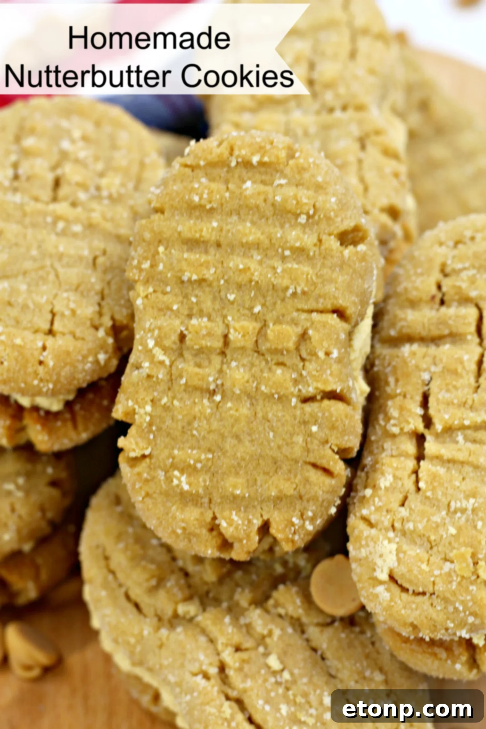 A close-up shot of a finished homemade Nutterbutter sandwich cookie with creamy filling.