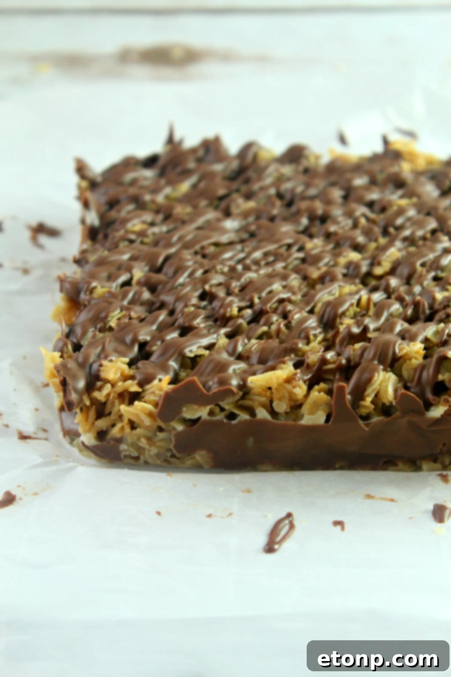 Effortless Chocolate Oatmeal Bliss Bars 4 No-bake chocolate oatmeal bars on a holiday platter ready for serving