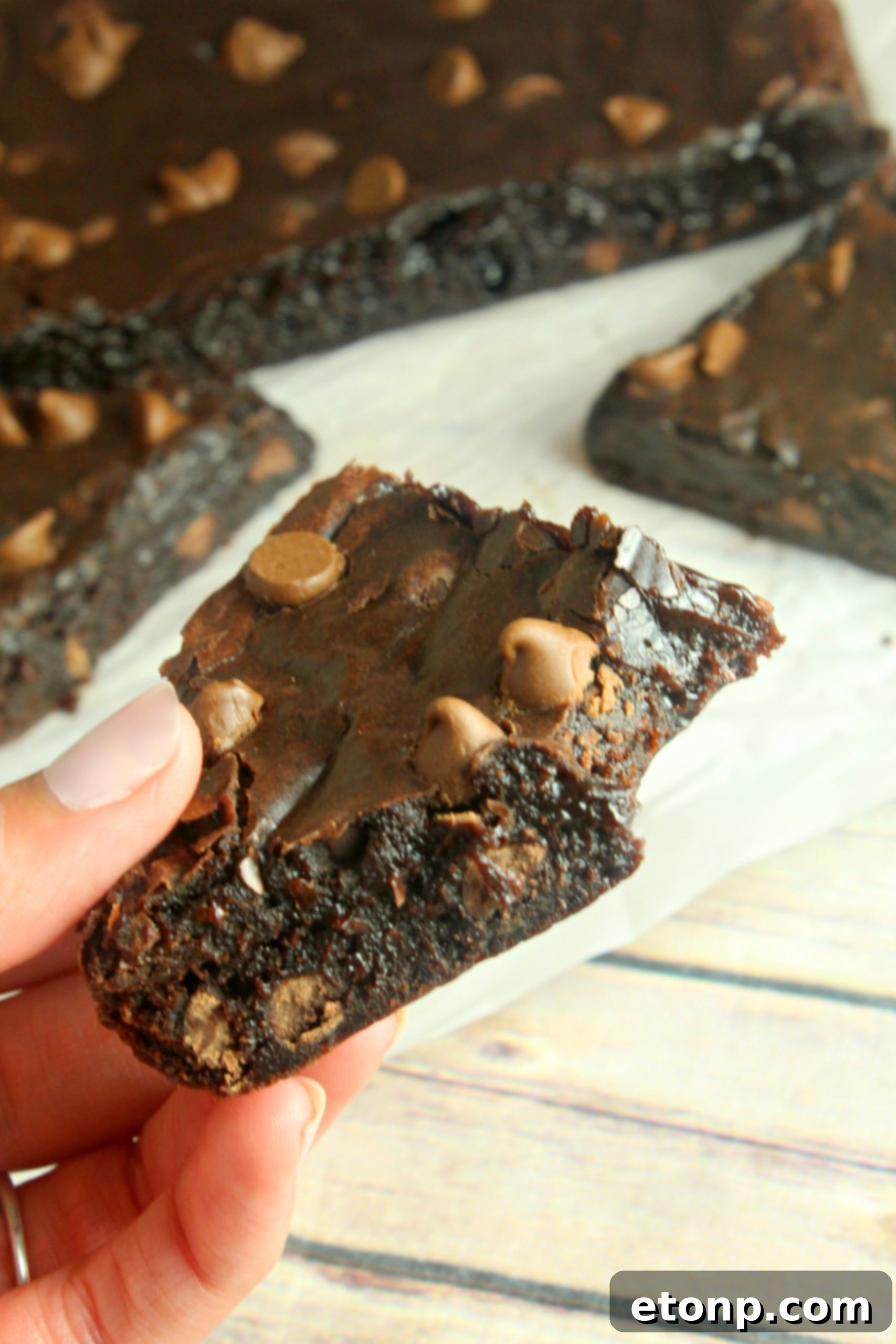 Delicious Triple Chocolate Lava Brownies cooling in a slow cooker, showcasing a rich, fudgy texture