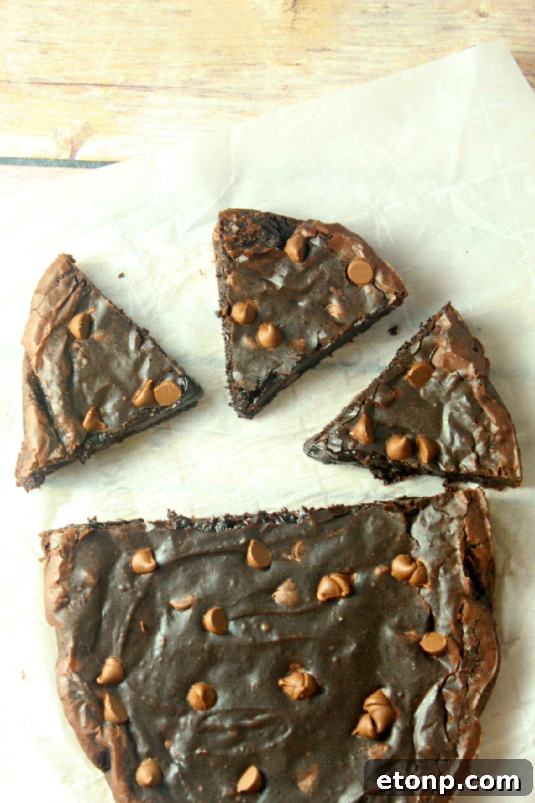 A freshly cooked batch of slow cooker triple chocolate lava brownies, garnished and ready for serving