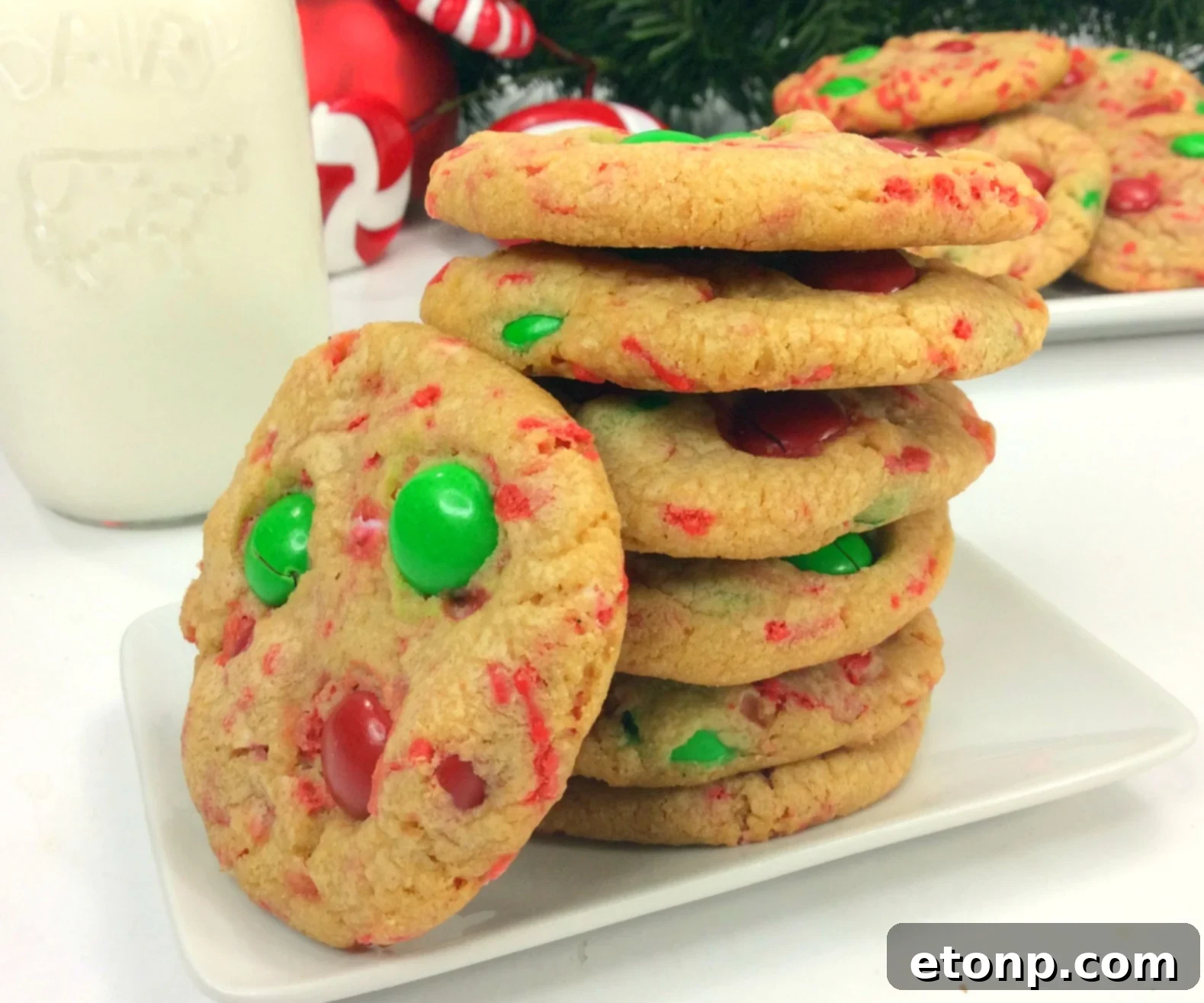 Festive Christmas Pudding Cookies 5 Baked Christmas Pudding Cookies on a cooling rack