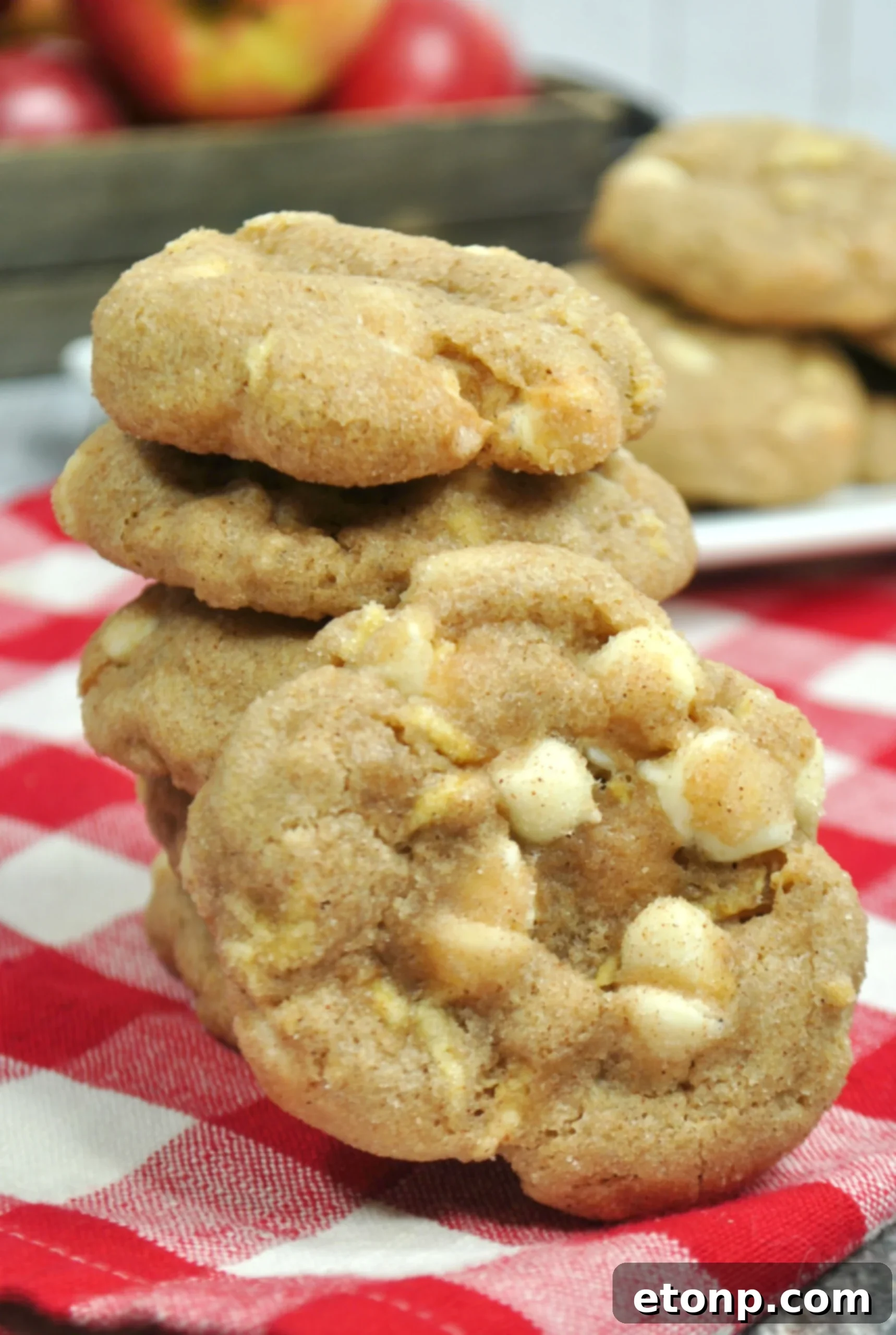 Decadent White Chocolate Snickerdoodle Cookies 2 Close-up of a stack of White Chocolate Snickerdoodle Cookies with white chocolate chips visible