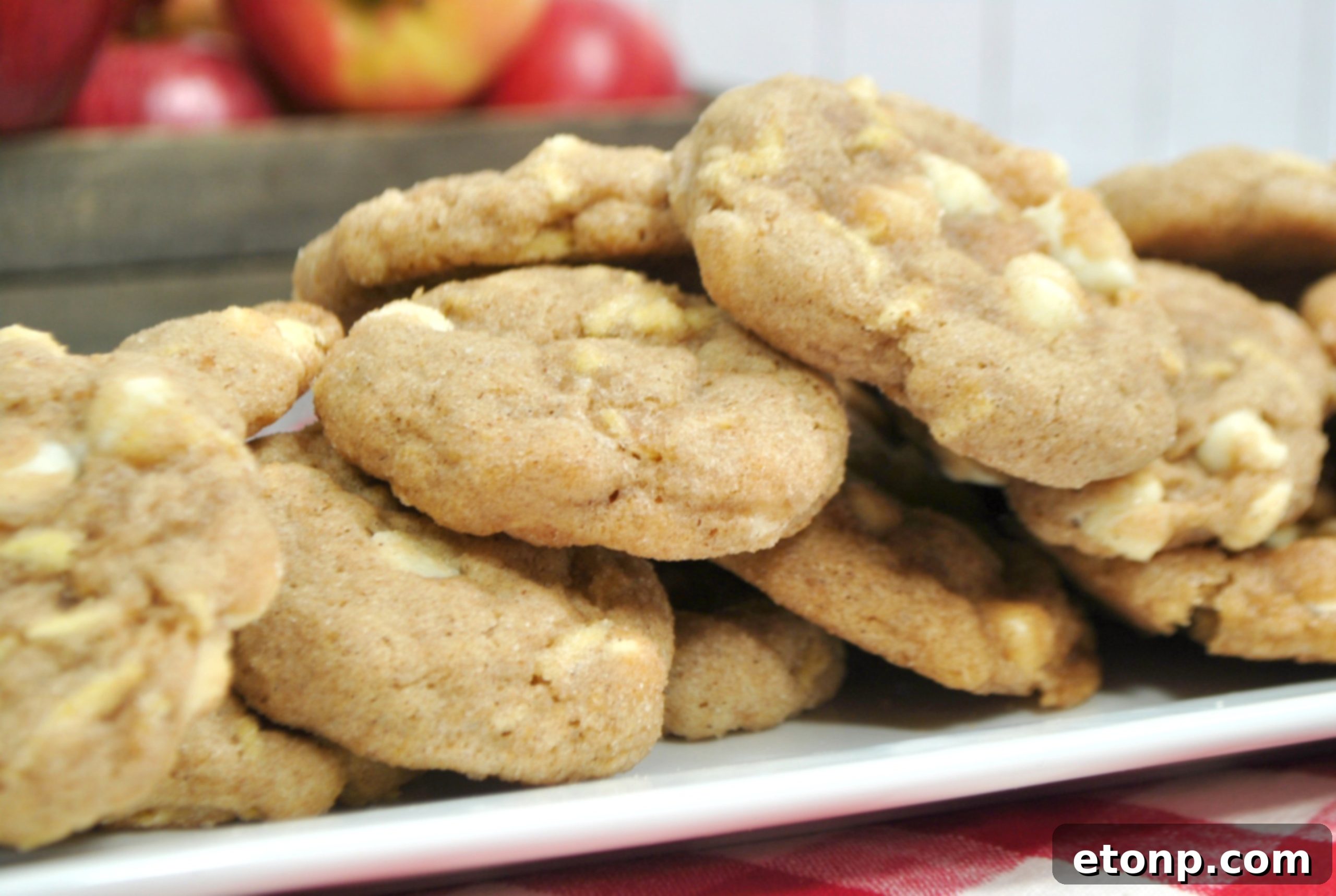 Decadent White Chocolate Snickerdoodle Cookies 4 A plate of freshly baked White Chocolate Snickerdoodle Cookies, dusted with cinnamon sugar