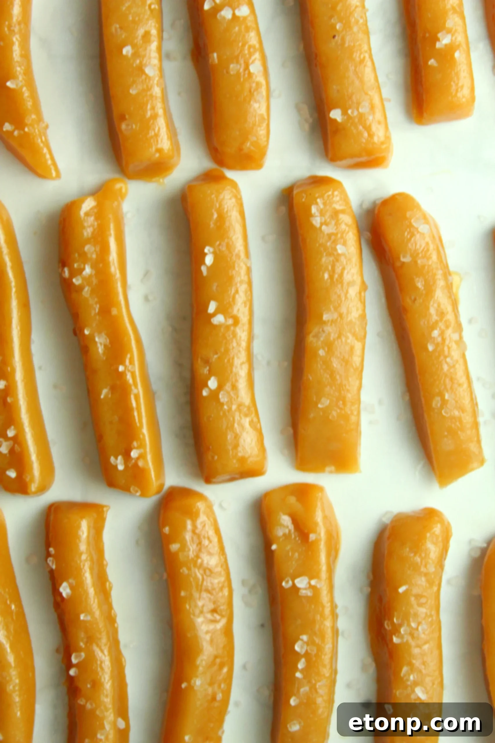 A collection of handmade salted caramels ready for packaging or enjoyment.
