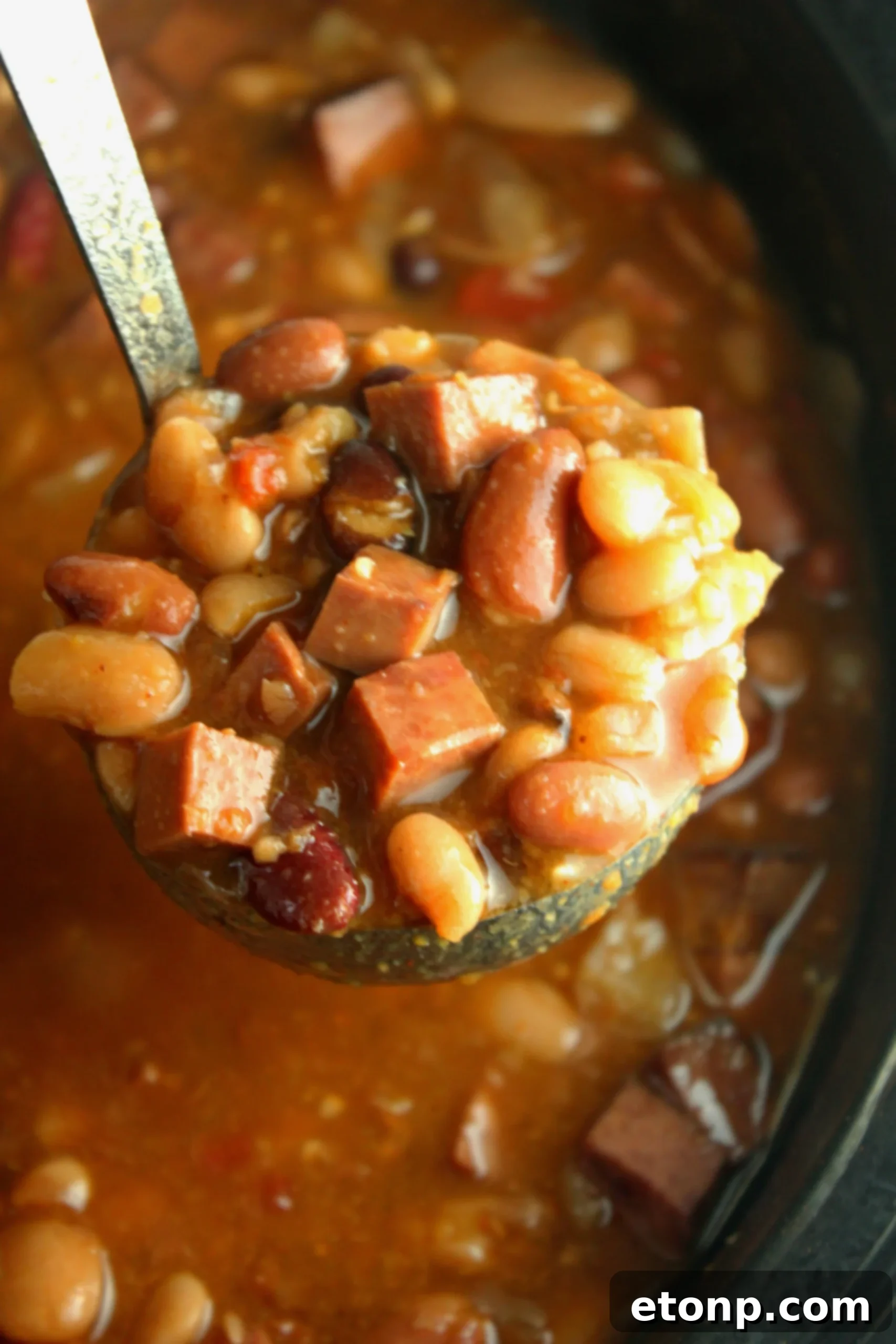 Hearty Ham and Bean Crock-Pot Classic 8 A large pot of Slow Cooker Ham and Bean Soup