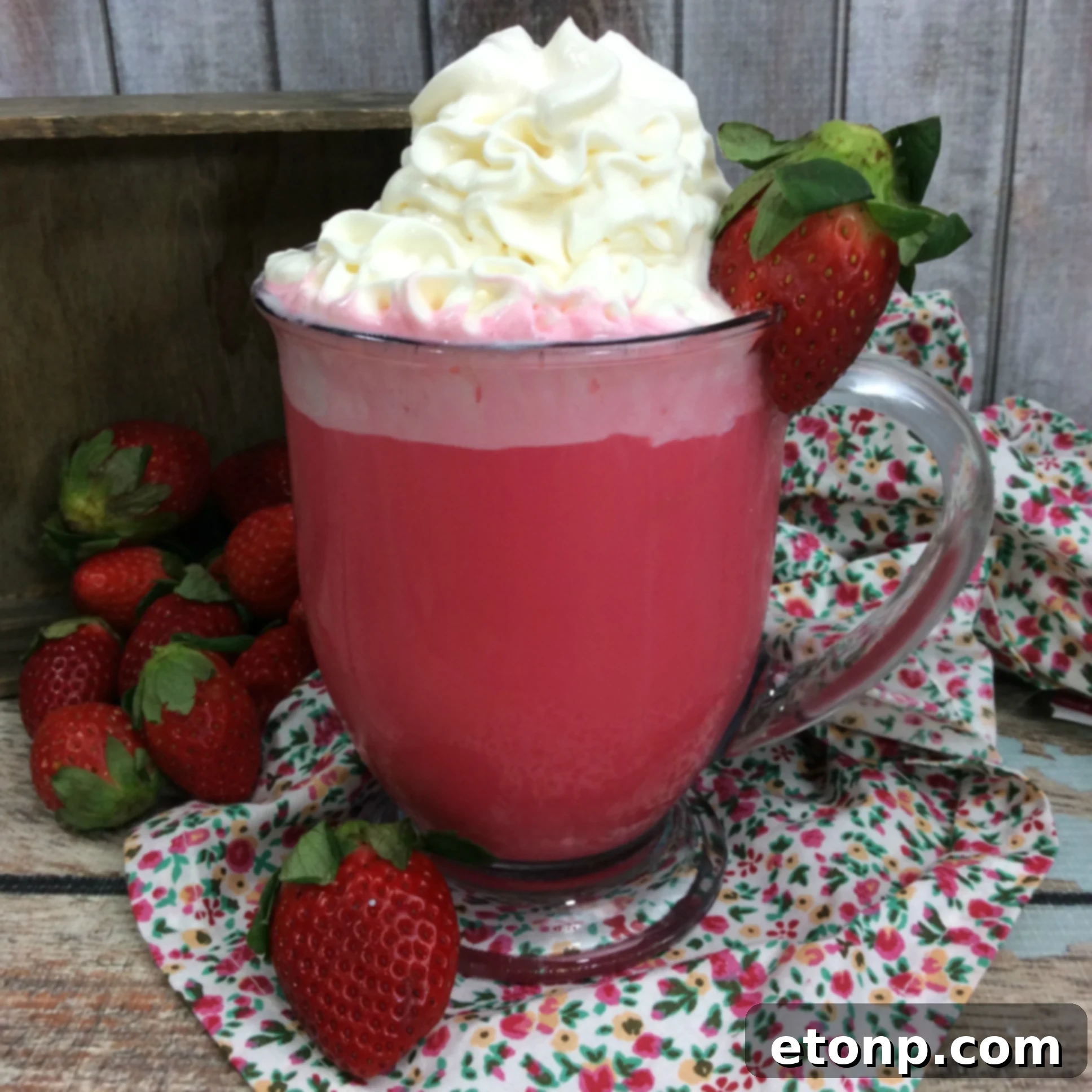 Blushing Strawberry White Hot Chocolate 3 Close-up of a steaming mug of Strawberry White Hot Cocoa, showing the creamy texture and hint of pink color, ready to be enjoyed.