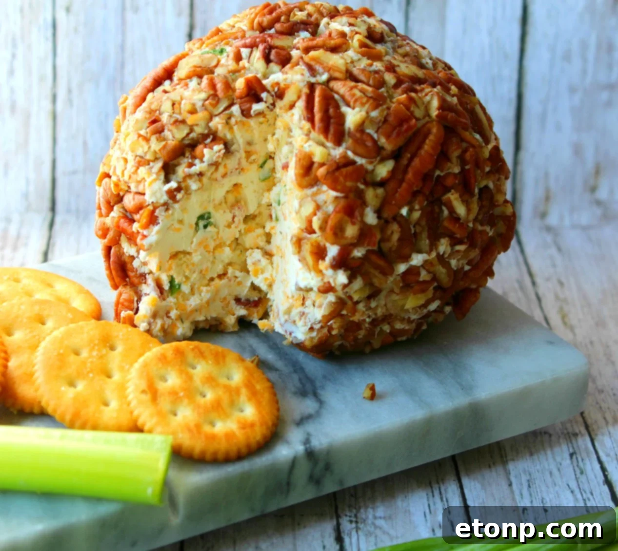 Bacon Cheddar Ranch Cheeseball on a festive platter
