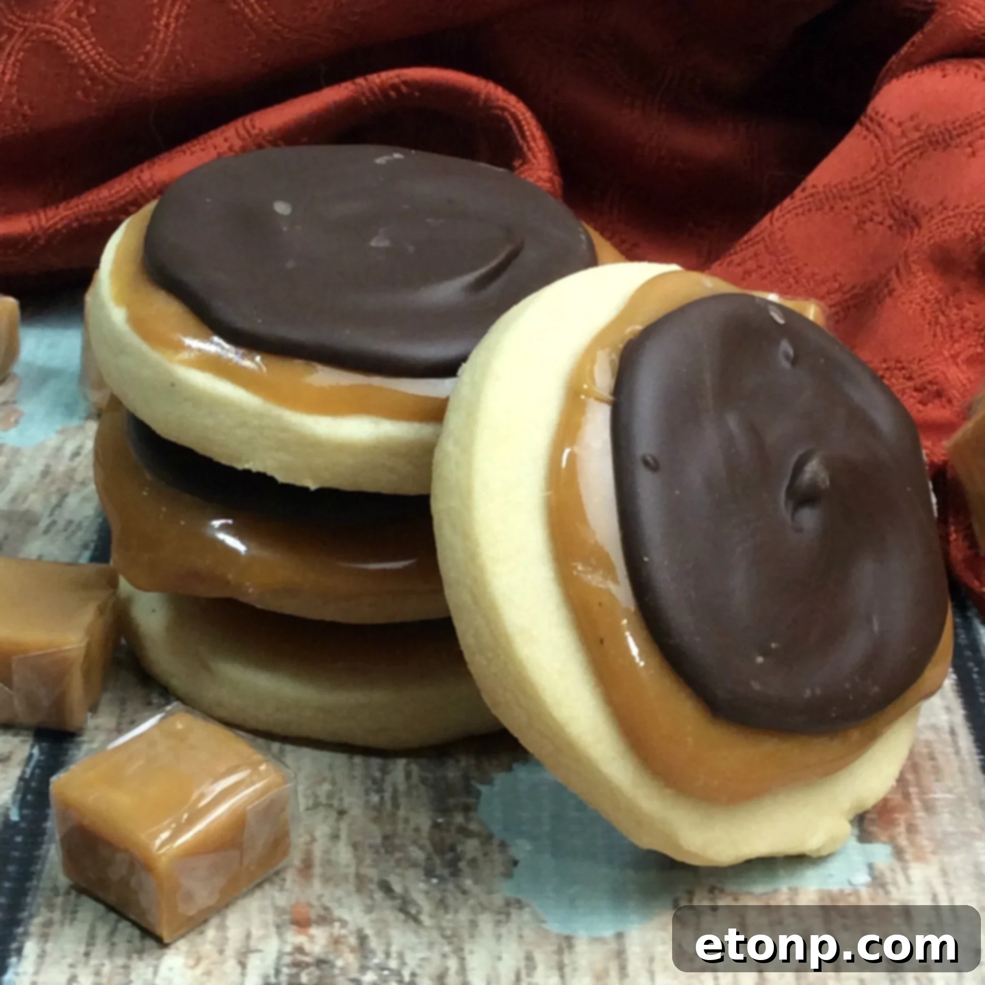 Copycat Twix Cookies 3 Another perspective of Twix Cookies, showcasing their appealing golden-brown shortbread and thick chocolate topping.