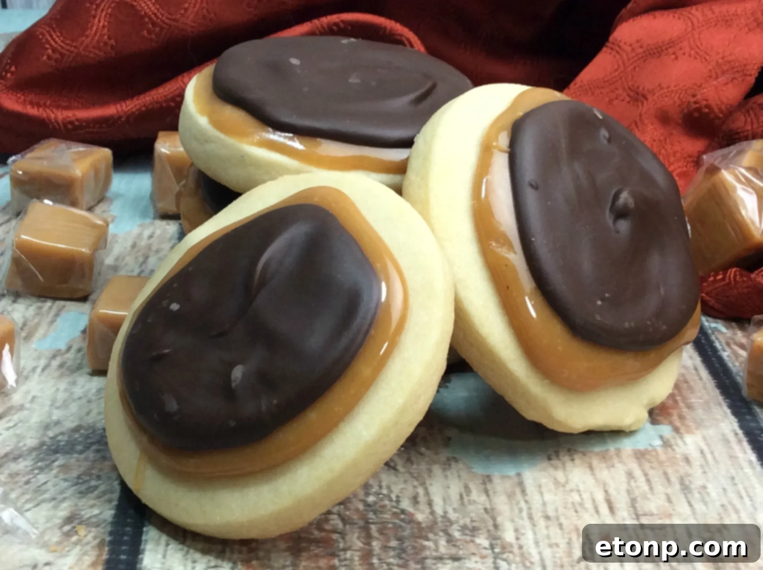 Copycat Twix Cookies 5 Homemade Twix Cookies presented as a festive gift, tied with a ribbon, perfect for sharing during the holidays.