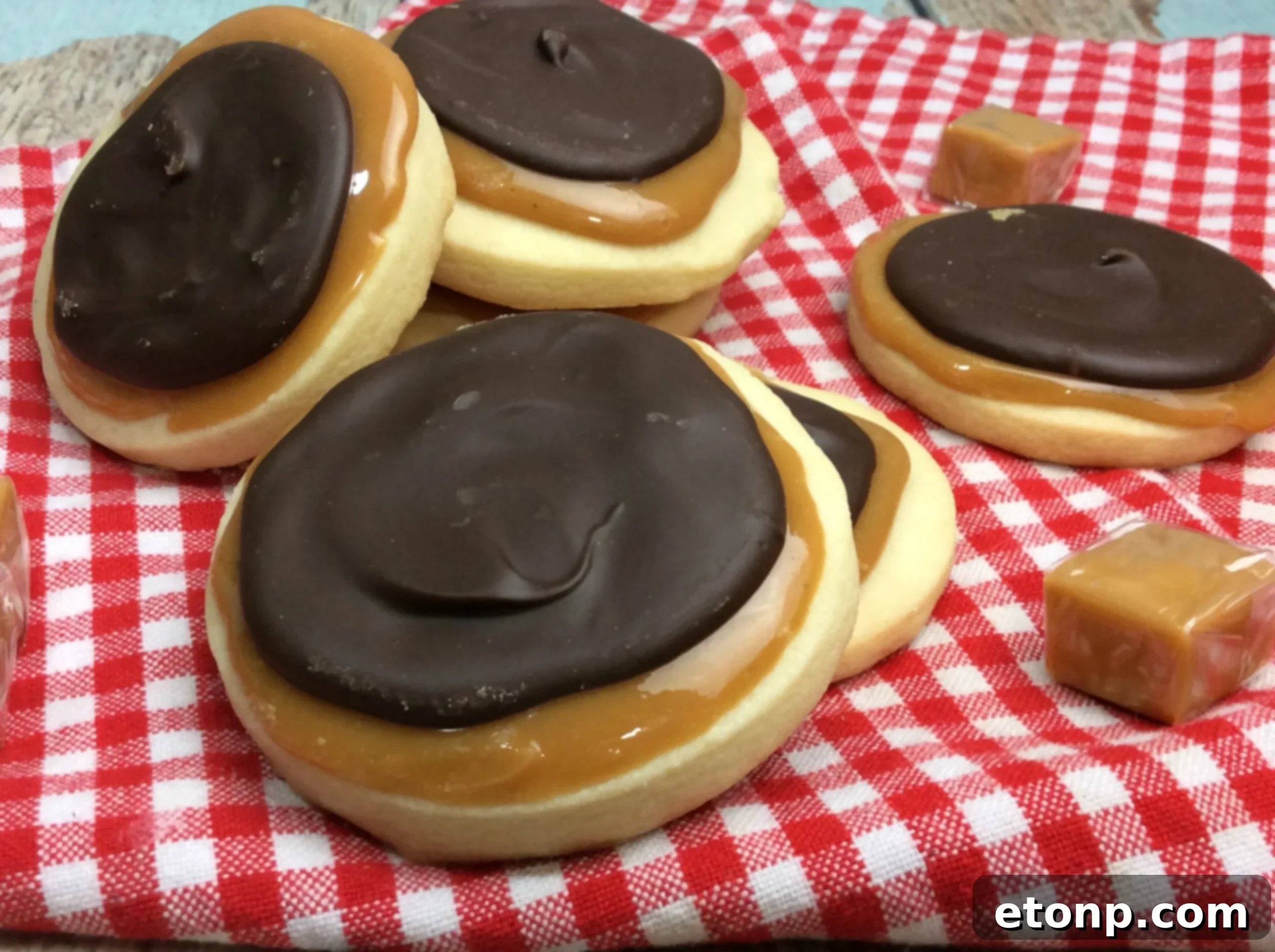 Copycat Twix Cookies 6 Various angles of Twix Cookies, emphasizing their rich textures and the distinct layers of shortbread, caramel, and chocolate.