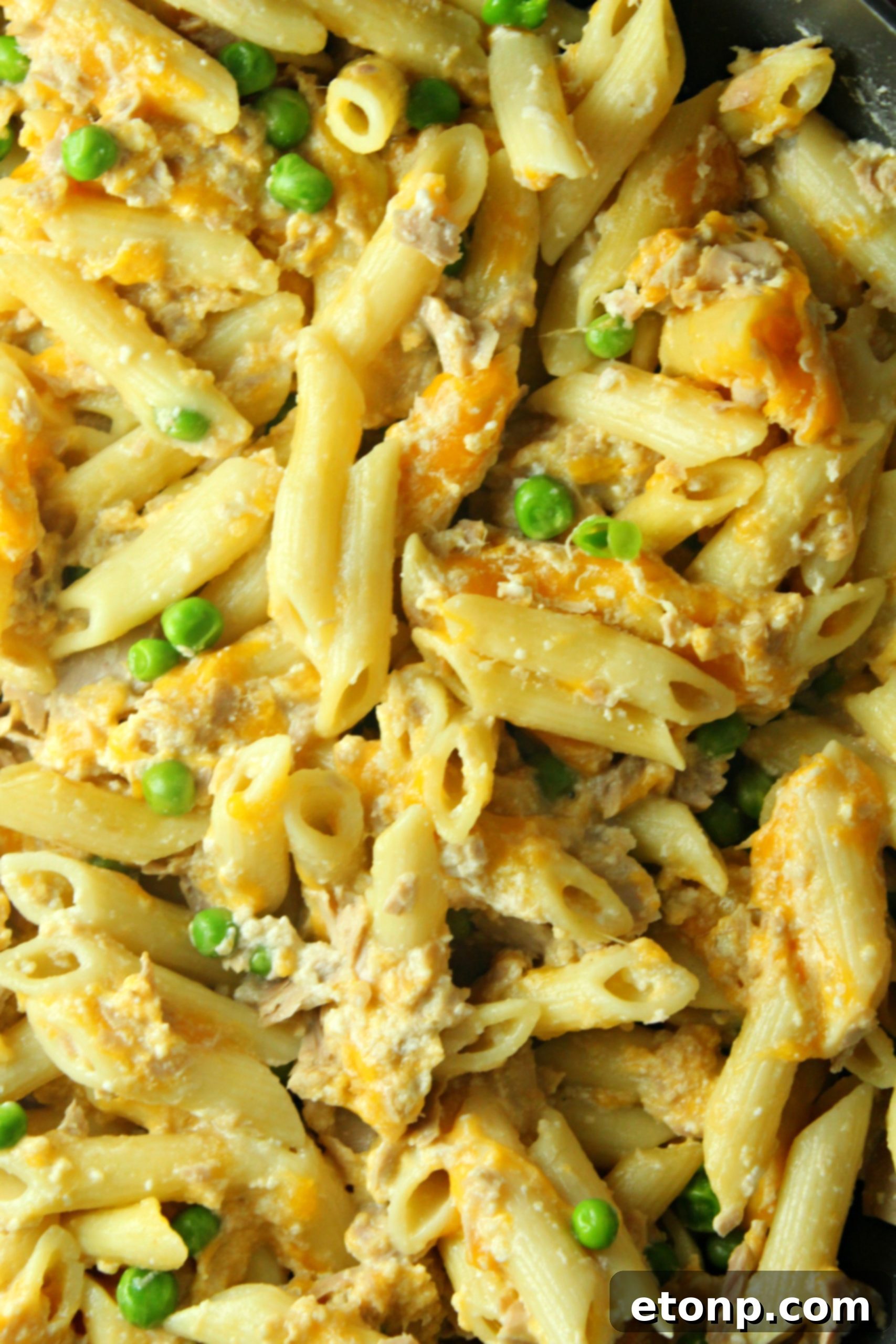 Family-sized pot of Cheesy Tuna Casserole, nearly empty, showing its popularity