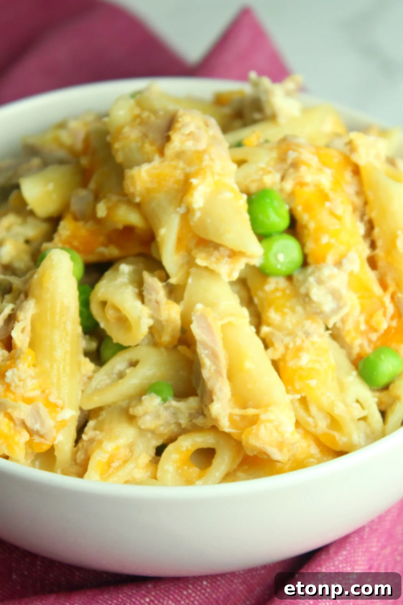 A large pot filled with a delicious Cheesy Tuna Casserole, perfect for a one-pot meal