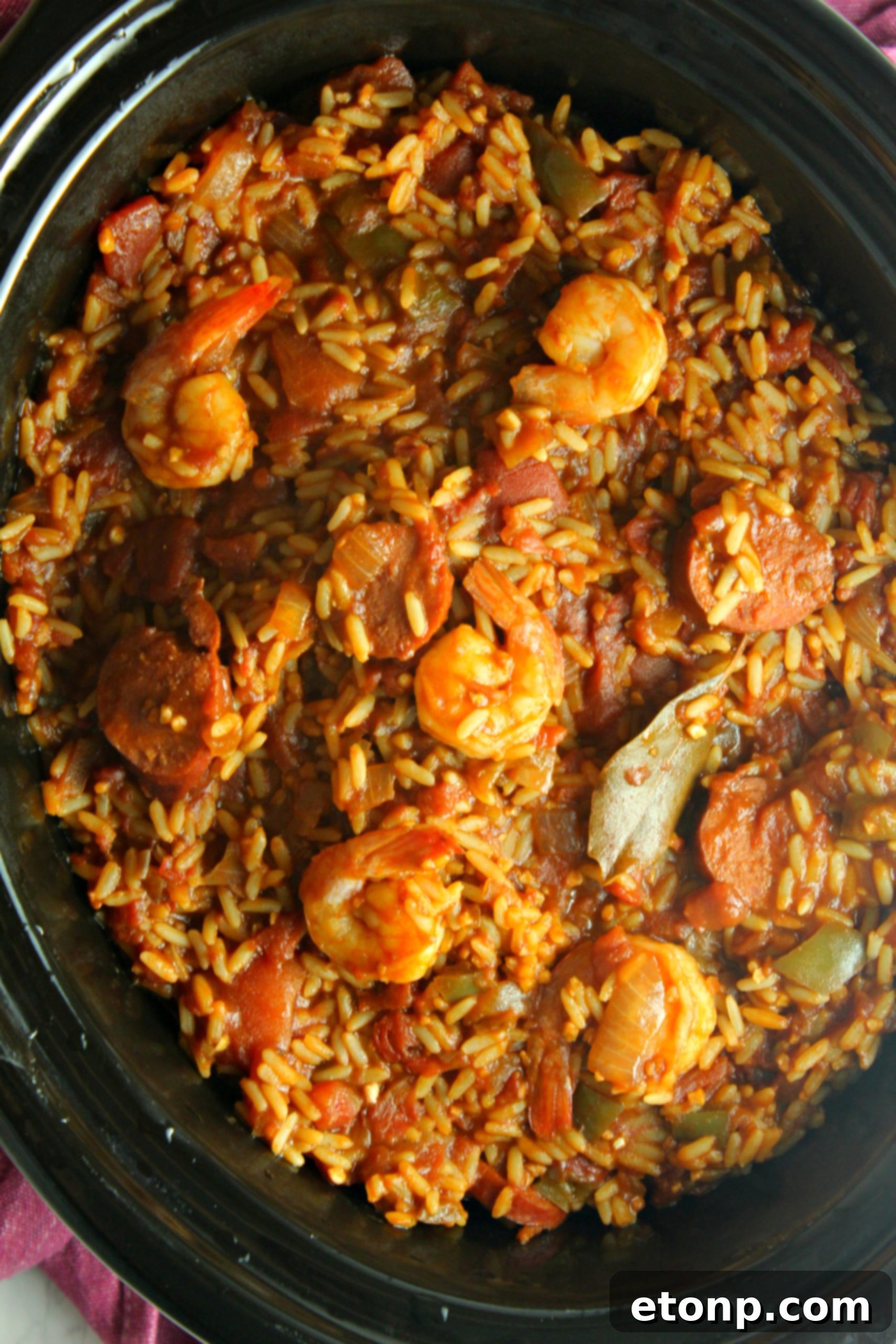 Close-up of Slow Cooker Jambalaya, emphasizing the texture and rich color of the dish