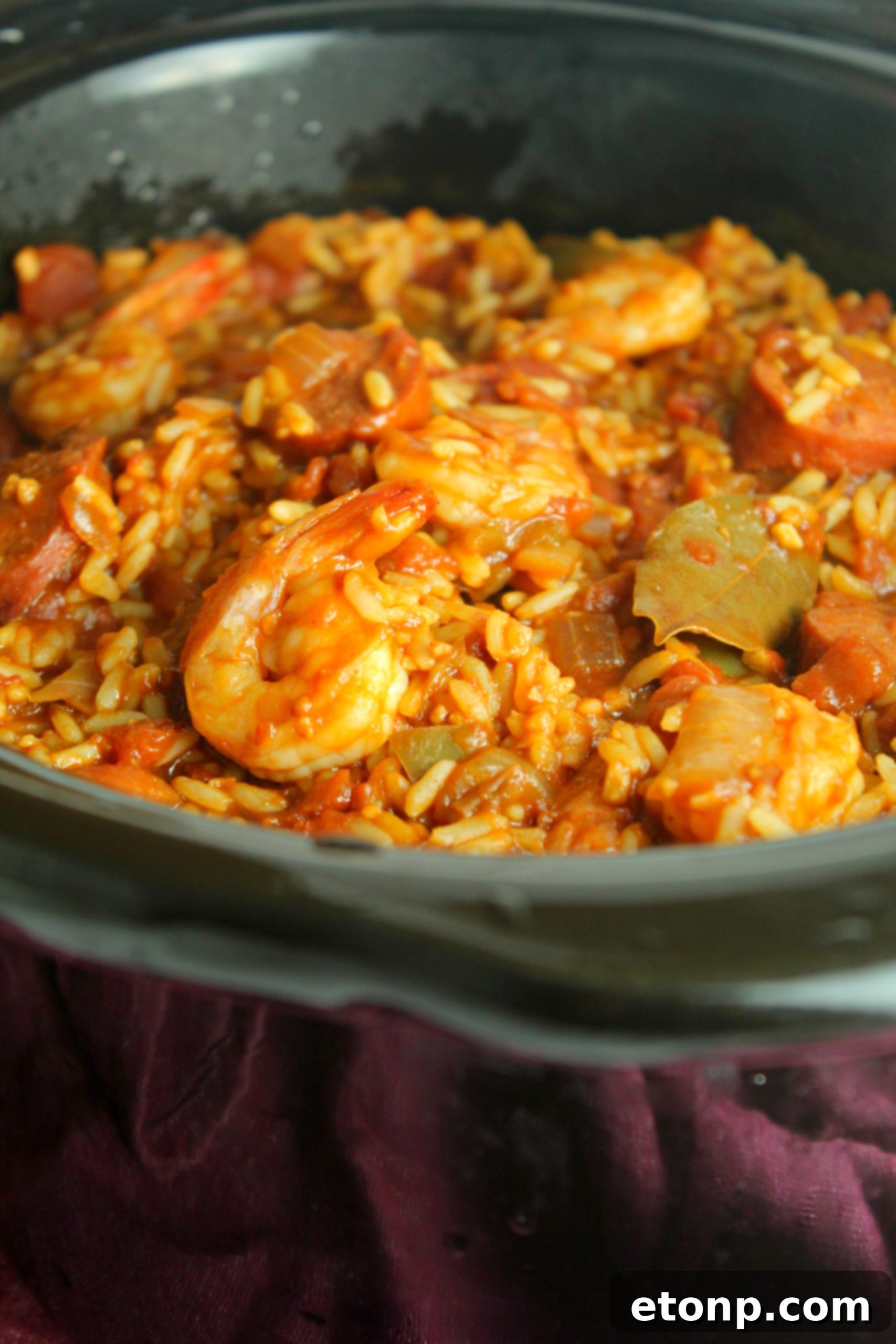 Overhead shot of Slow Cooker Jambalaya ingredients pre-cooking, showing fresh vegetables and sausage