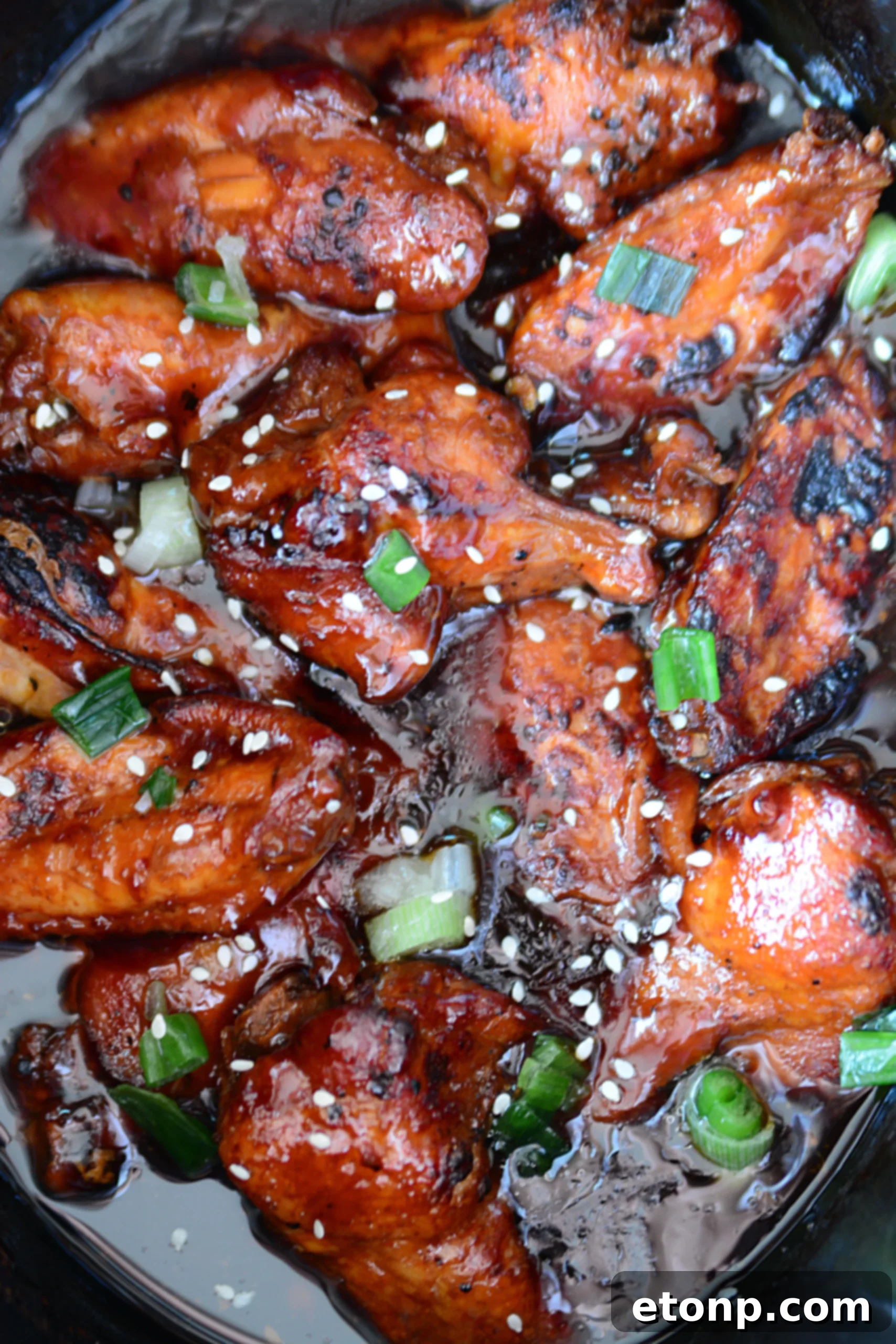 Mouthwatering Slow Cooker Teriyaki Chicken Wings, perfectly glazed and ready to eat