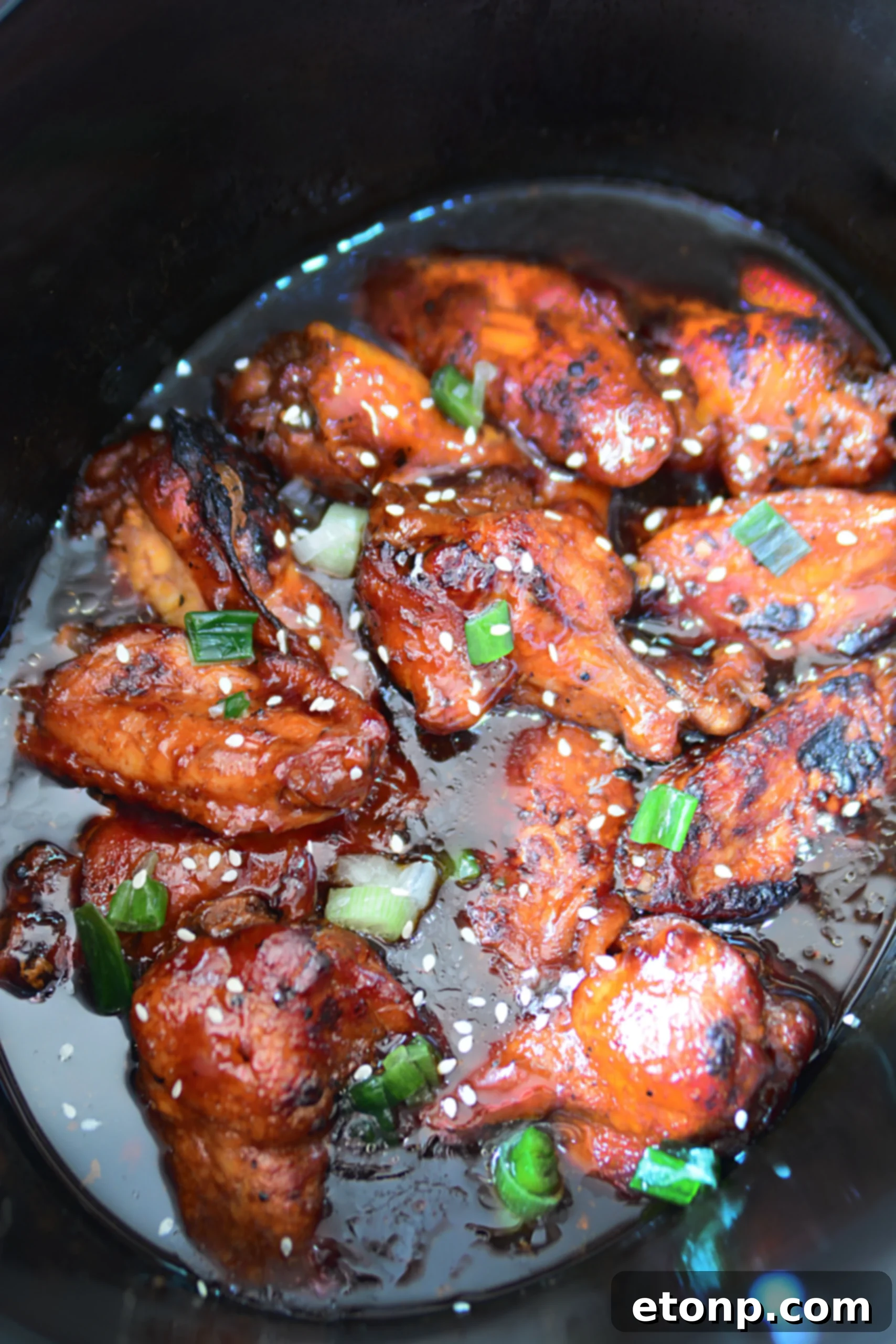 Teriyaki chicken wings served with rice, making a delicious dinner or appetizer