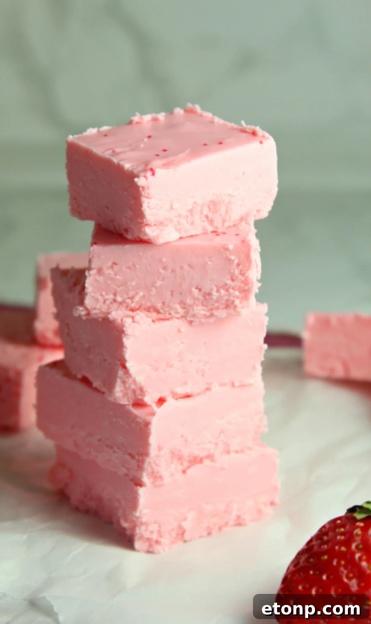 Effortless Strawberry Two-Ingredient Fudge 6 Close up of a single piece of strawberry no-bake fudge