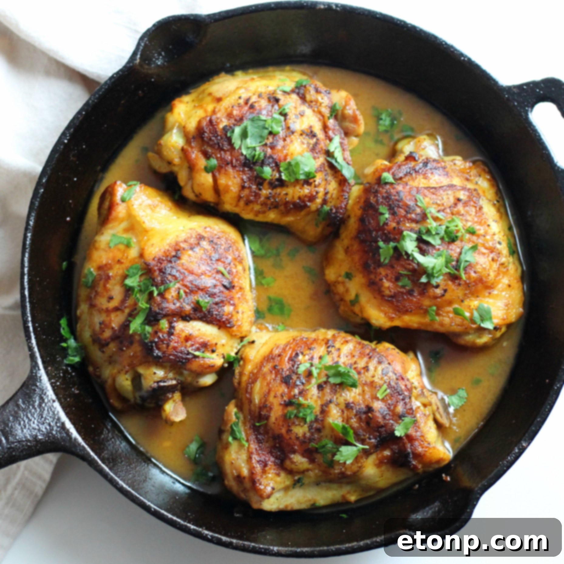 Sticky Sweet Lemon Chicken Skillet 6 A serving of brown sugar lemon chicken with fluffy white rice, garnished with fresh parsley.