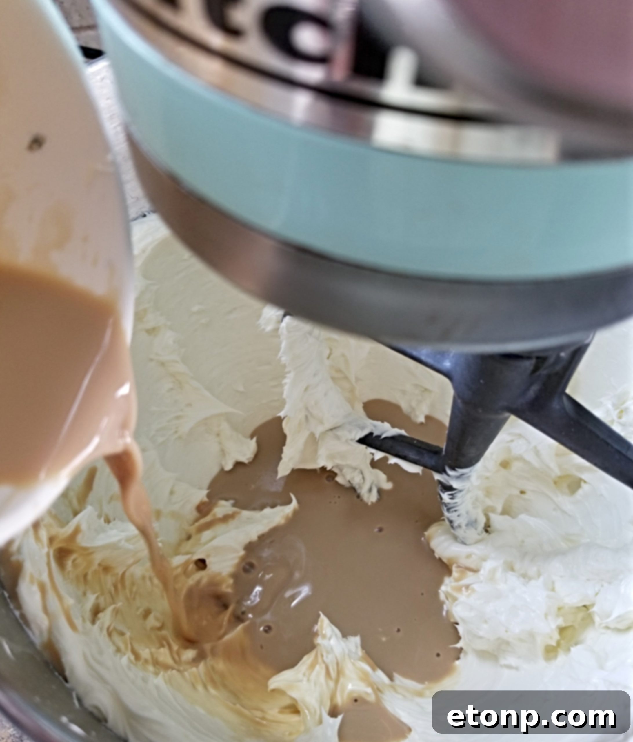 Another perspective of the Bailey's Chocolate Cheesecake, highlighting the thick, creamy filling.