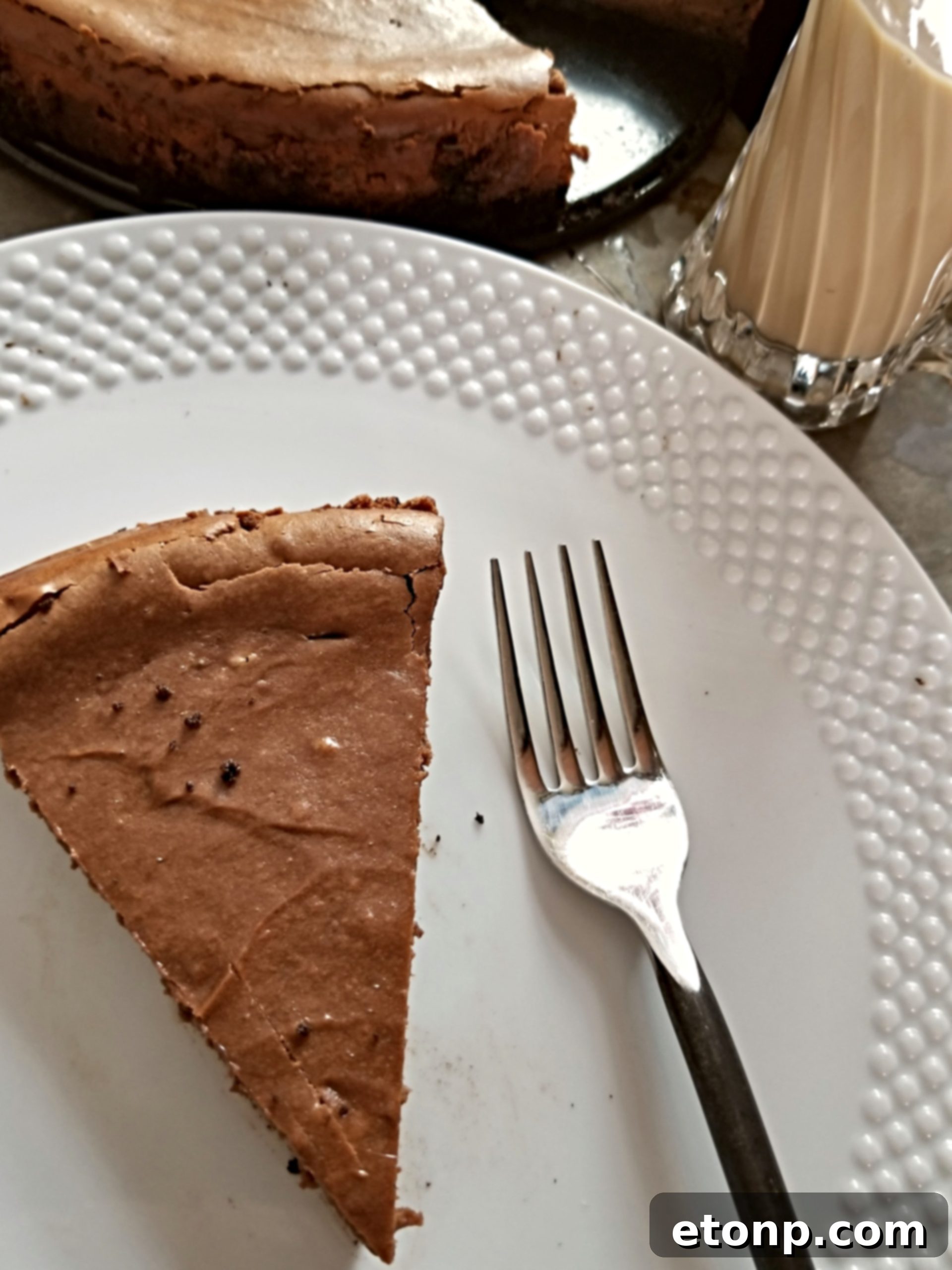 A closer view of the creamy chocolate filling and the Oreo crust.