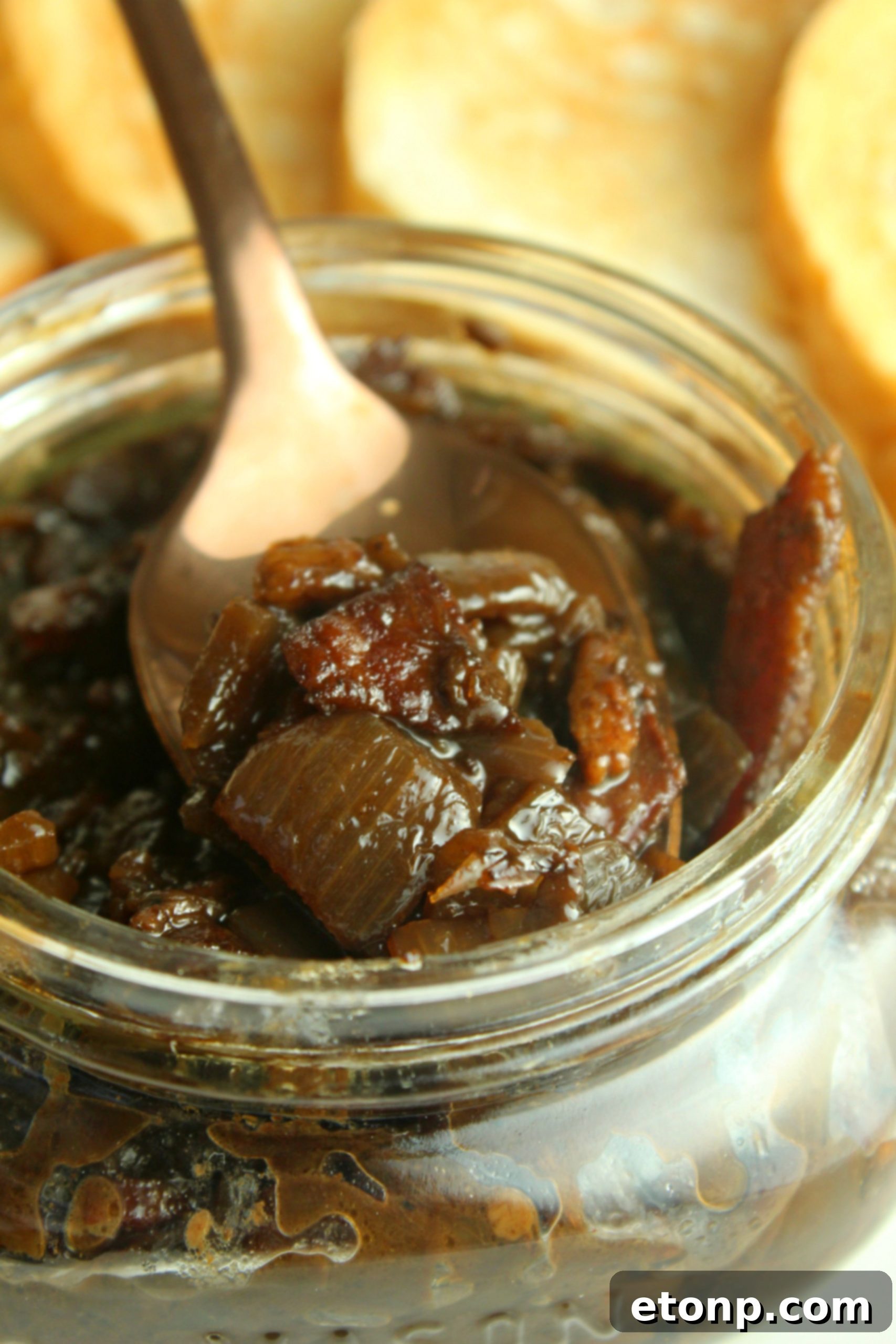 Raw, unsmoked thick-cut bacon strips, ideal for making rich and flavorful bacon jam