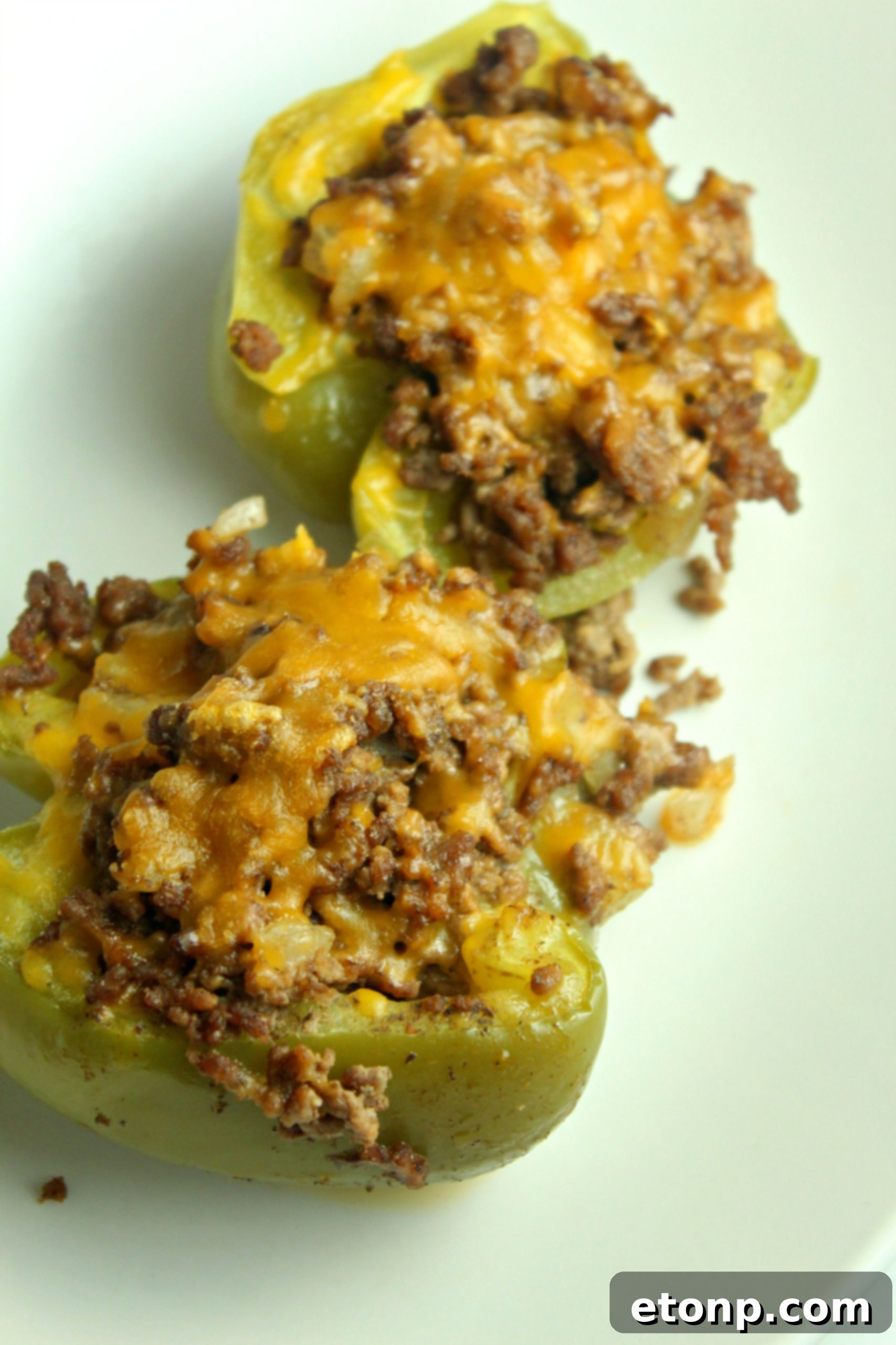 Philly Cheesesteak Pepper Boats 7 Cauliflower rice mixed with other ingredients, ready to be stuffed into peppers.