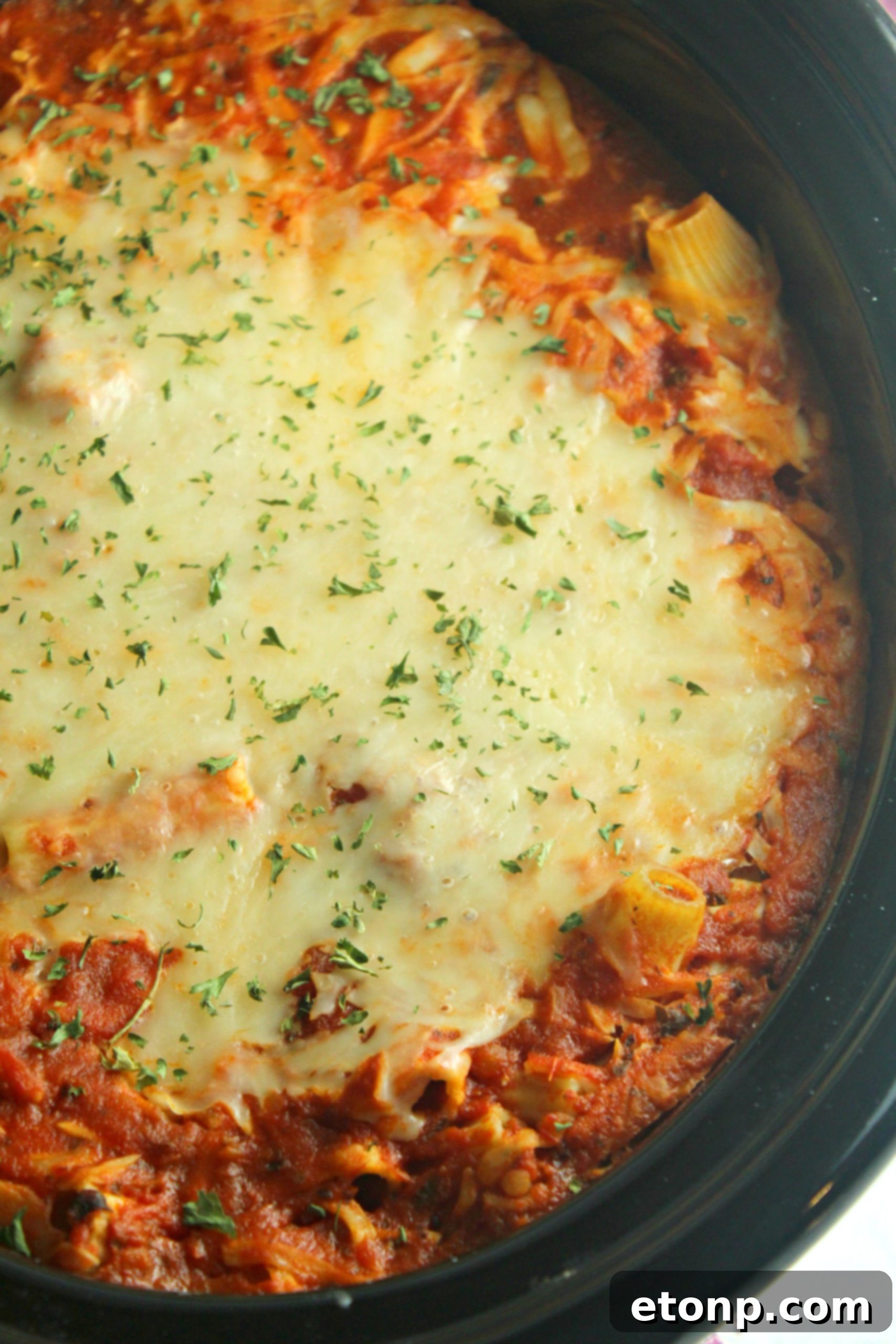 Set It and Forget It Cheesy Baked Ziti 5 A bowl of the creamy ricotta and herb cheese mixture, ready to be layered into the ziti.