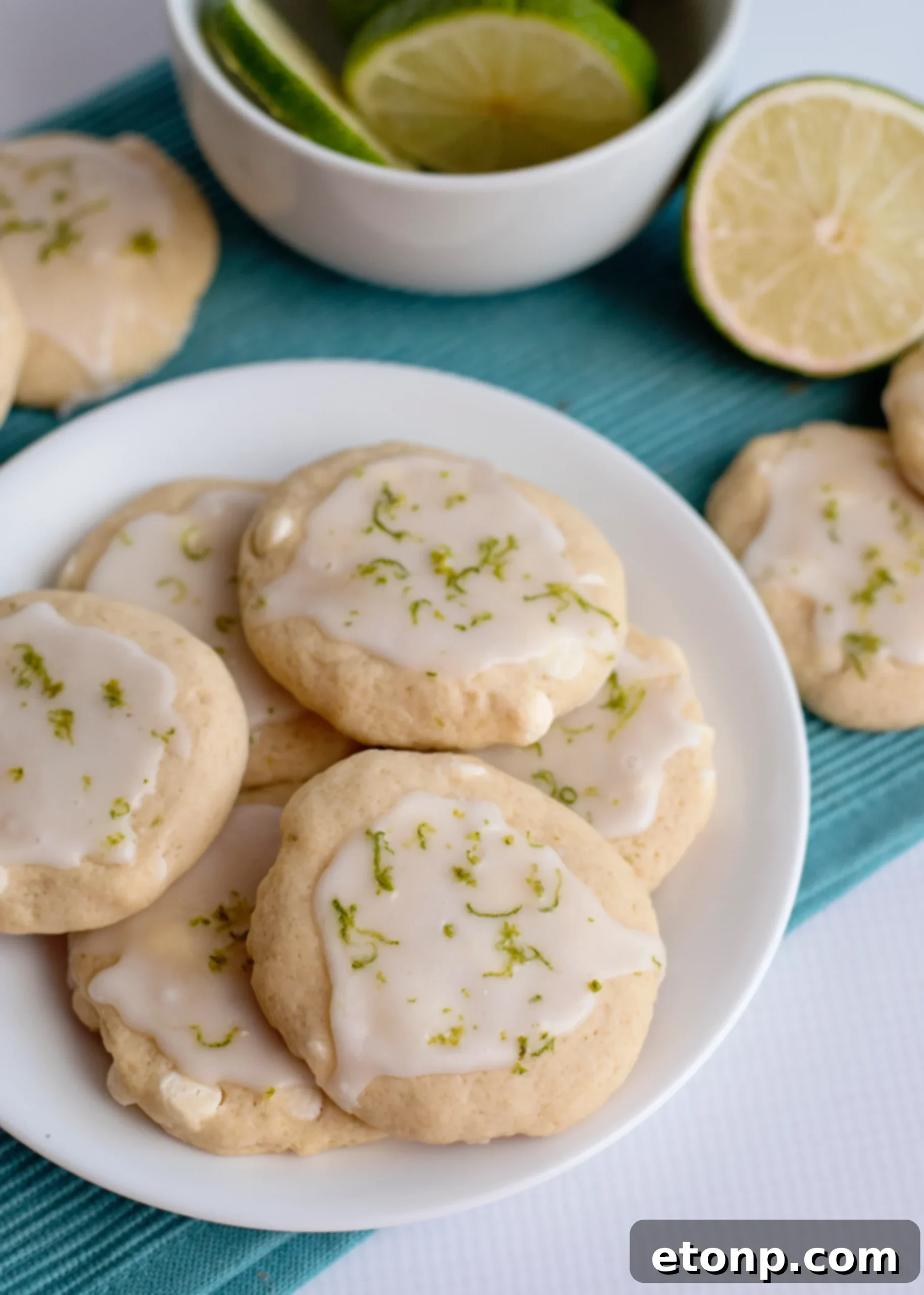 Assortment of freshly baked Key Lime Pie Cookies on a white plate